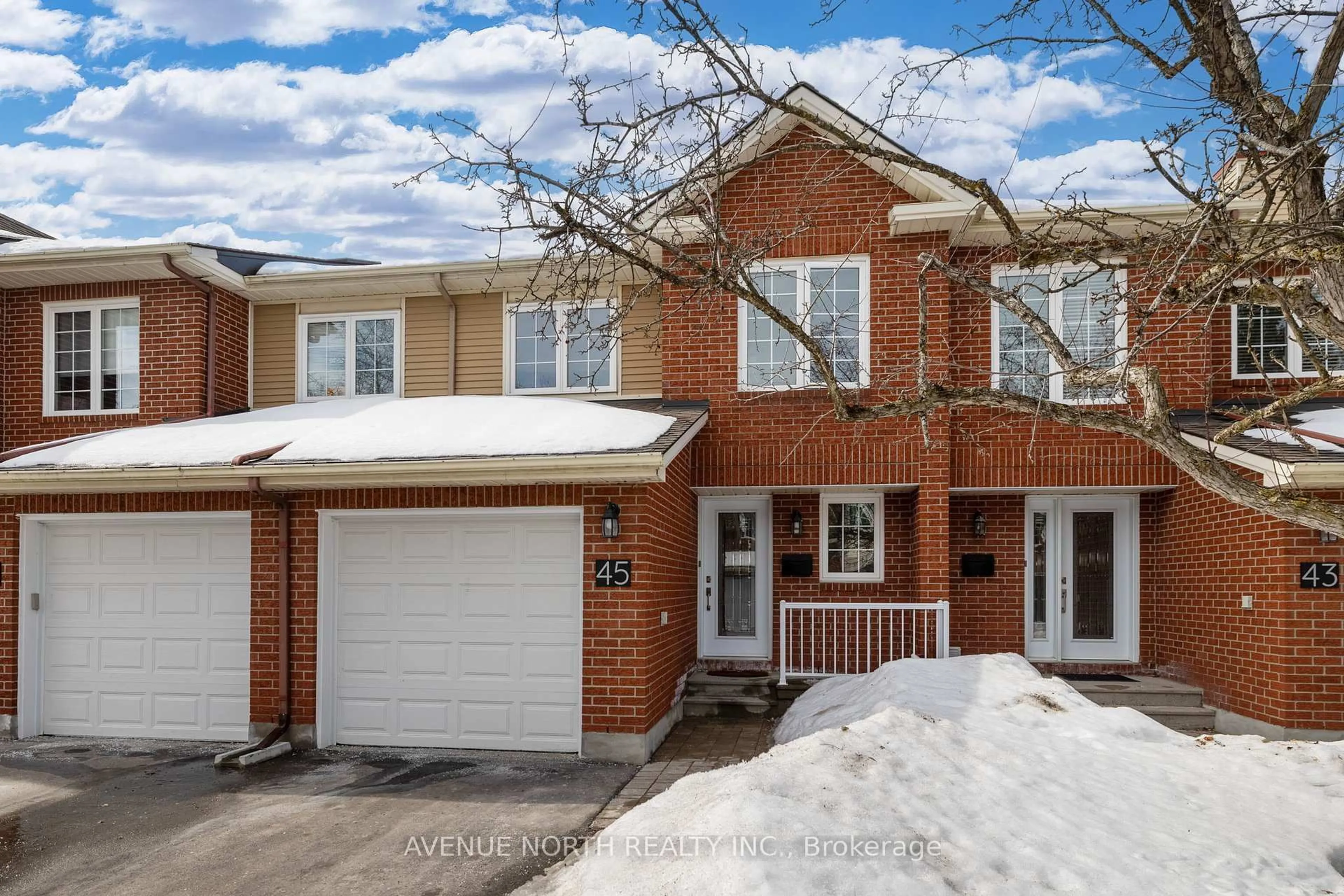 Home with brick exterior material, street for 45 Wrenwood Cres #23, Ottawa Ontario K2G 5V4