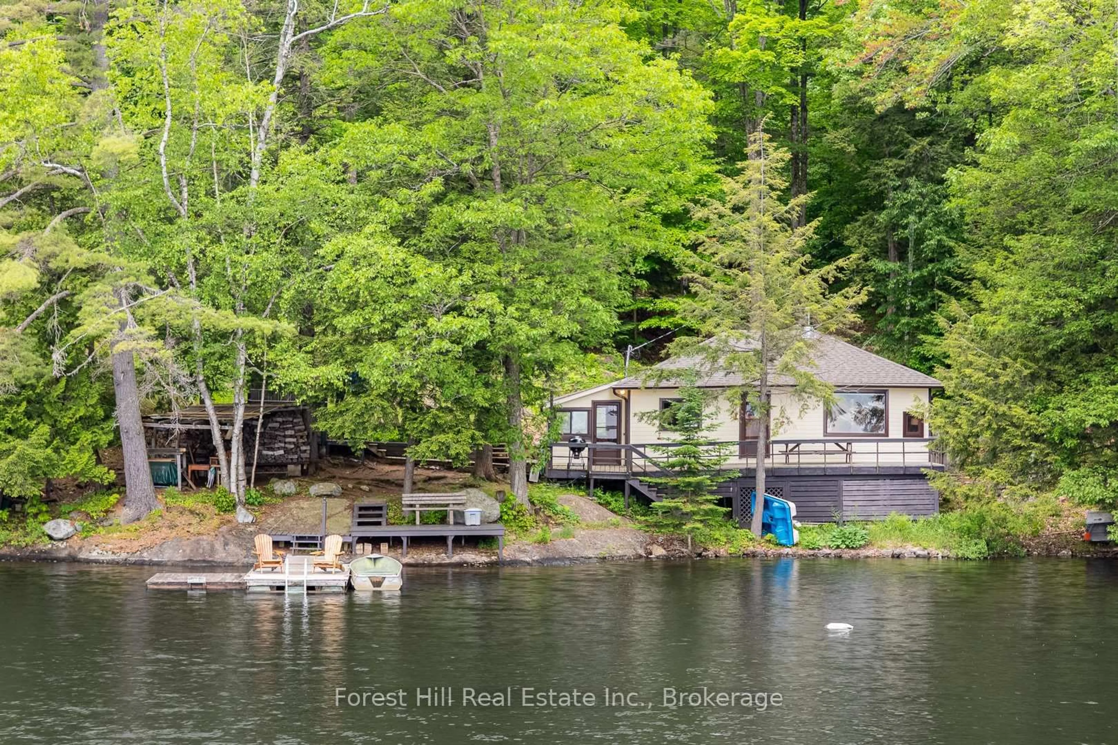 A pic from outside/outdoor area/front of a property/back of a property/a pic from drone, water/lake/river/ocean view for 1147 Tock Lane, Algonquin Highlands Ontario P0A 1E0