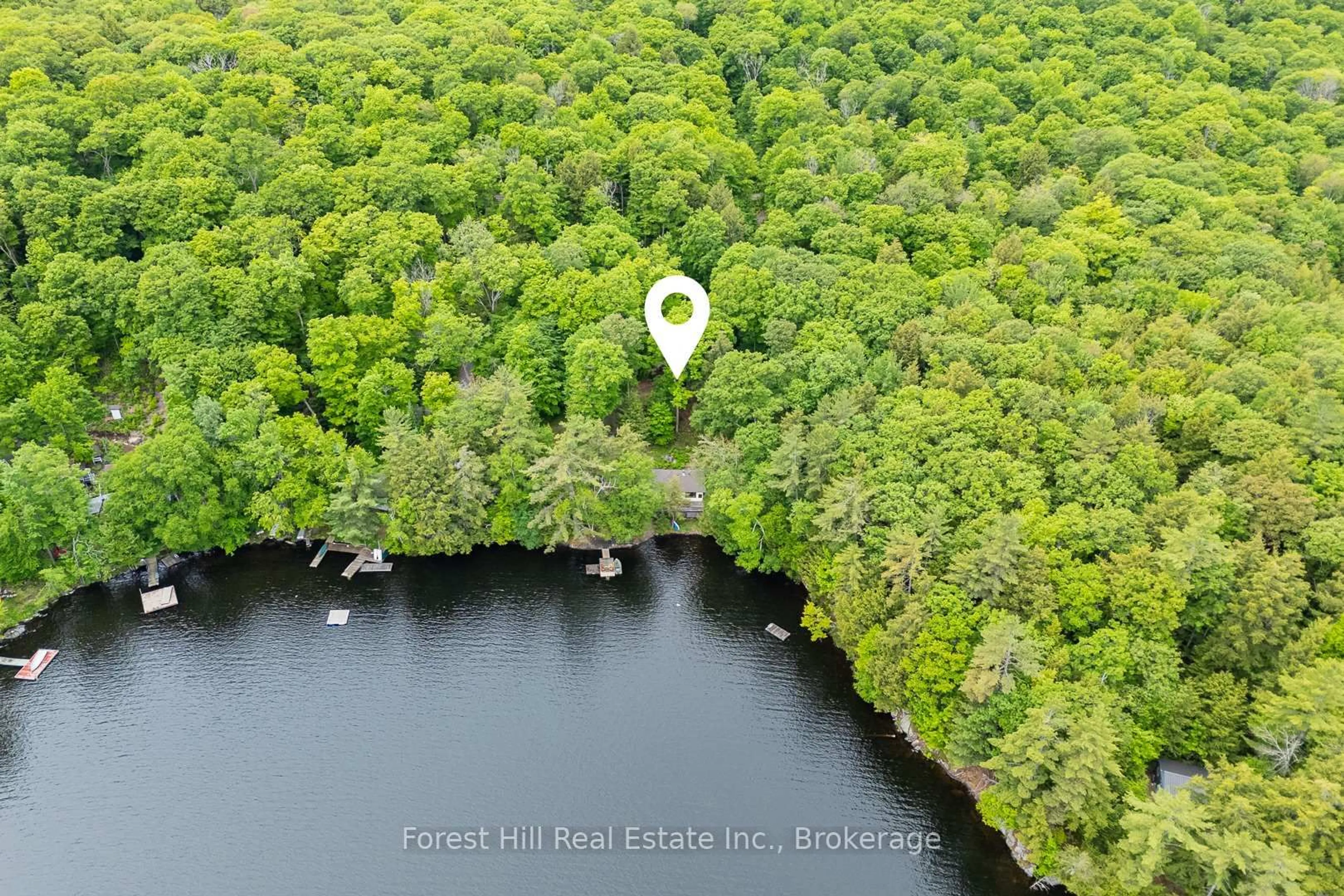 A pic from outside/outdoor area/front of a property/back of a property/a pic from drone, water/lake/river/ocean view for 1147 Tock Lane, Algonquin Highlands Ontario P0A 1E0