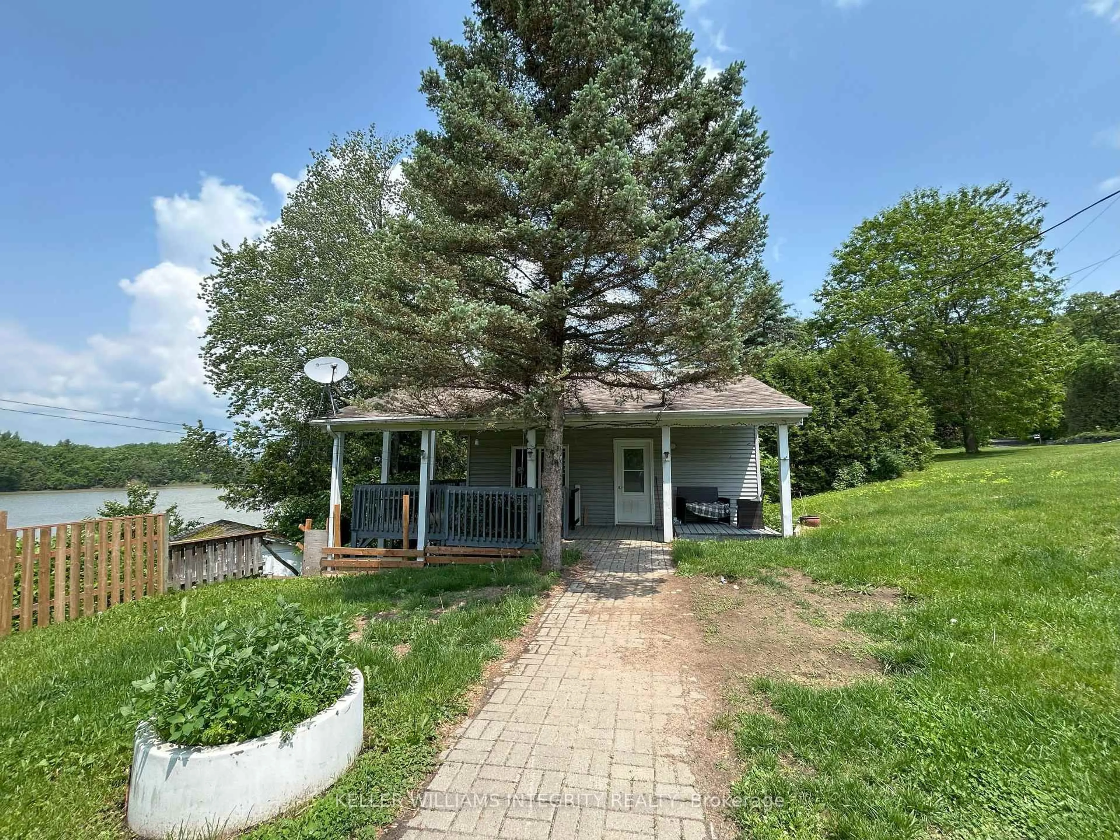A pic from outside/outdoor area/front of a property/back of a property/a pic from drone, water/lake/river/ocean view for 61 Leclair Rd, Alfred and Plantagenet Ontario K0B 1L0