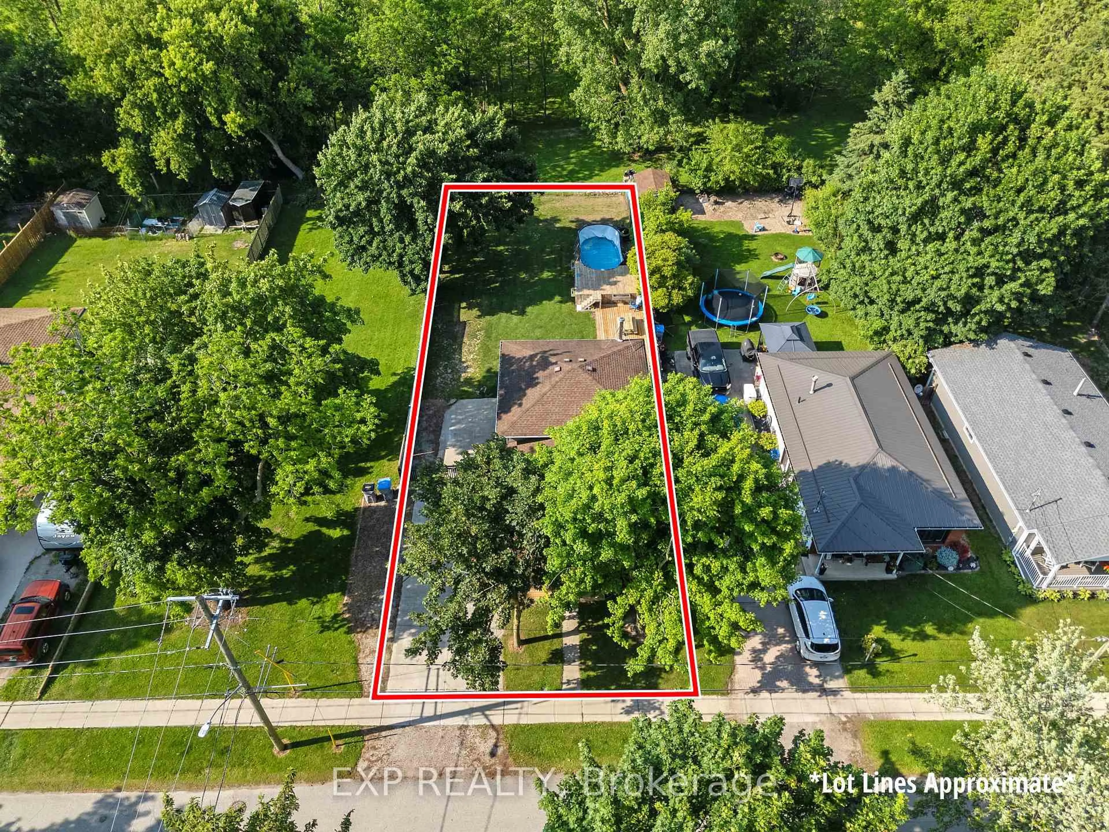 A pic from outside/outdoor area/front of a property/back of a property/a pic from drone, street for 250 William E St, North Middlesex Ontario N0M 2K0
