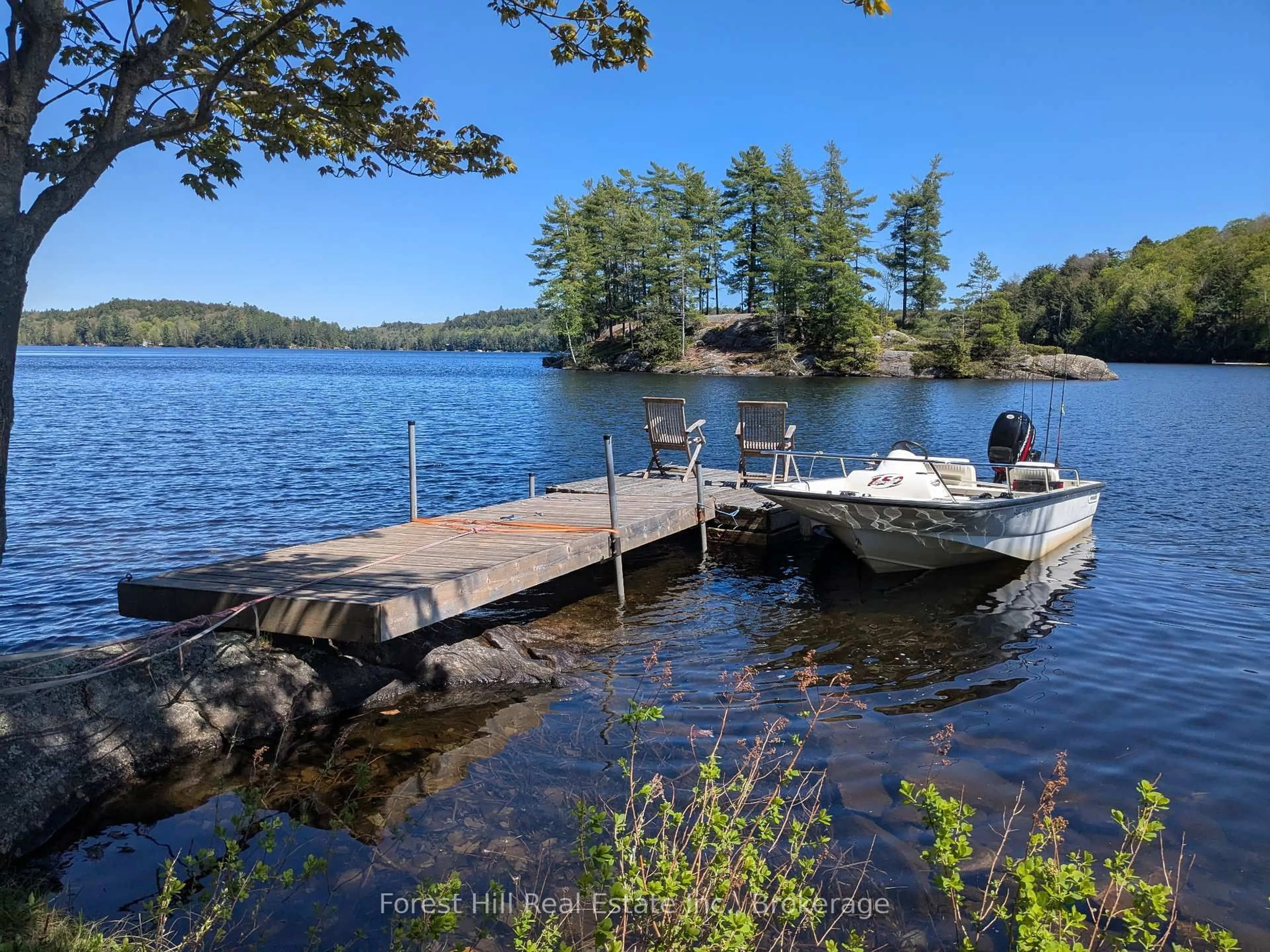 Patio, water/lake/river/ocean view for 1293 Causeway Dr, Algonquin Highlands Ontario P0A 1E0