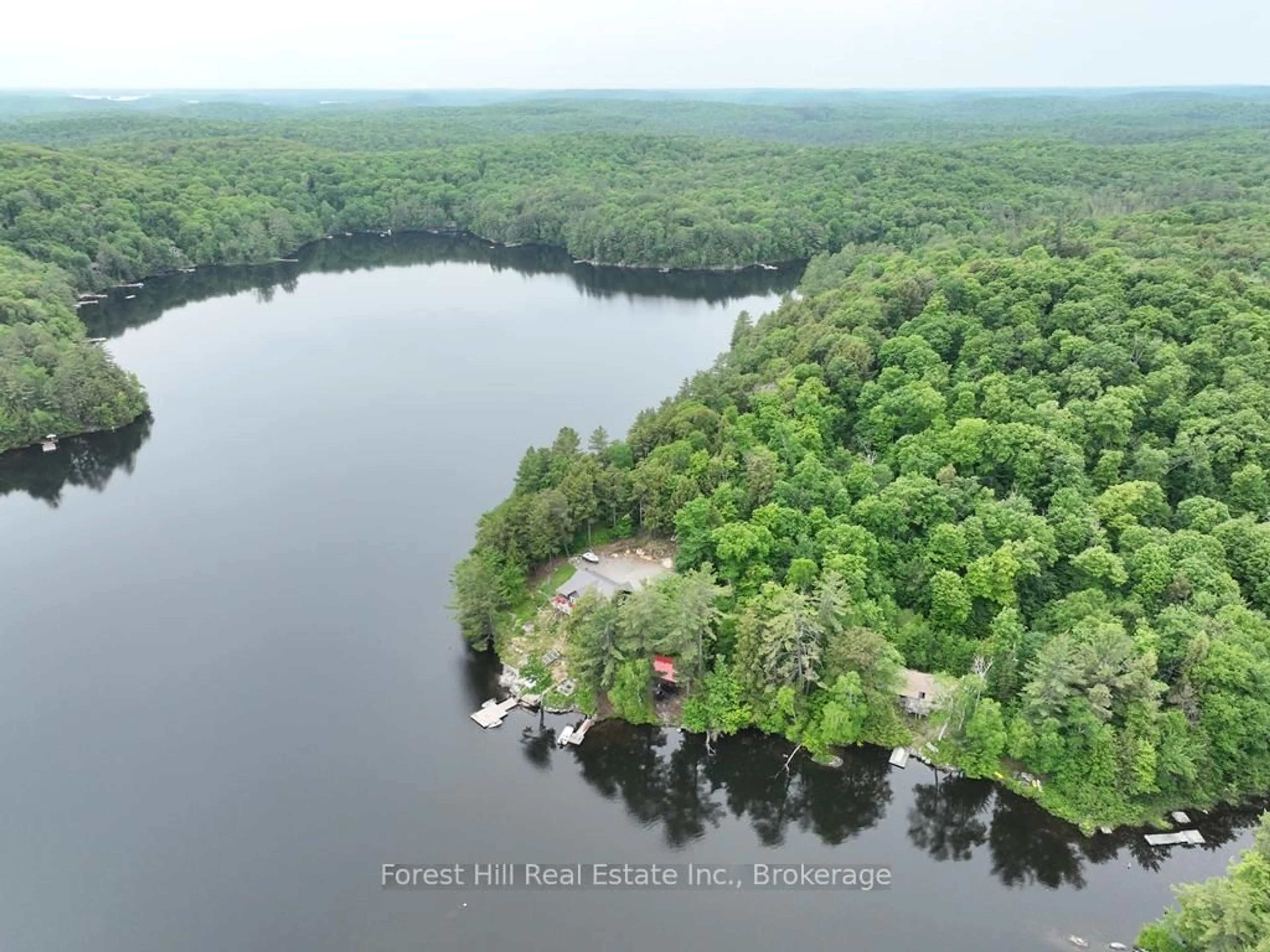 A pic from outside/outdoor area/front of a property/back of a property/a pic from drone, water/lake/river/ocean view for 1293 Causeway Dr, Algonquin Highlands Ontario P0A 1E0