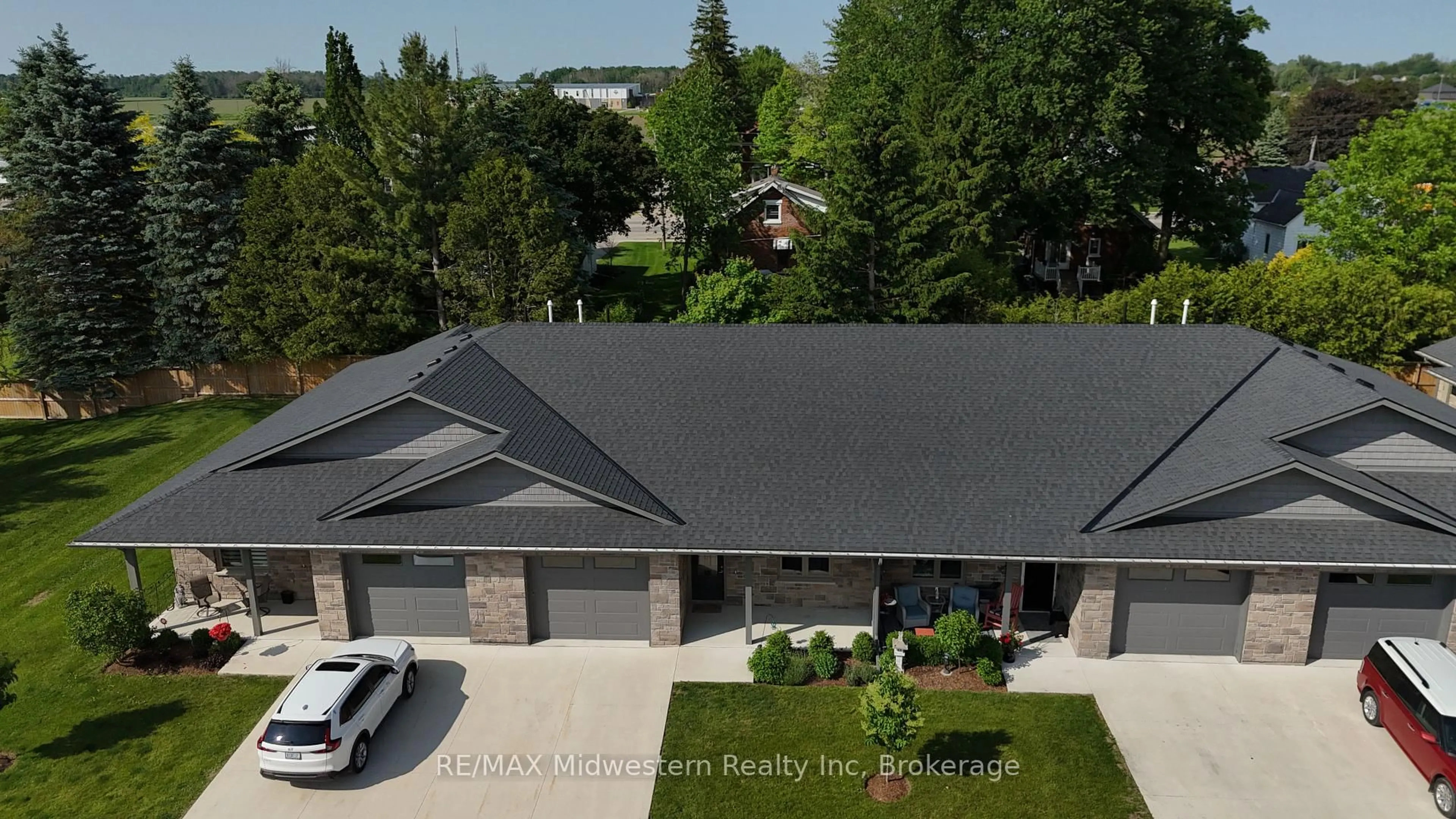 A pic from outside/outdoor area/front of a property/back of a property/a pic from drone, street for 375 Mitchell Rd ##71, North Perth Ontario N4W 0H4