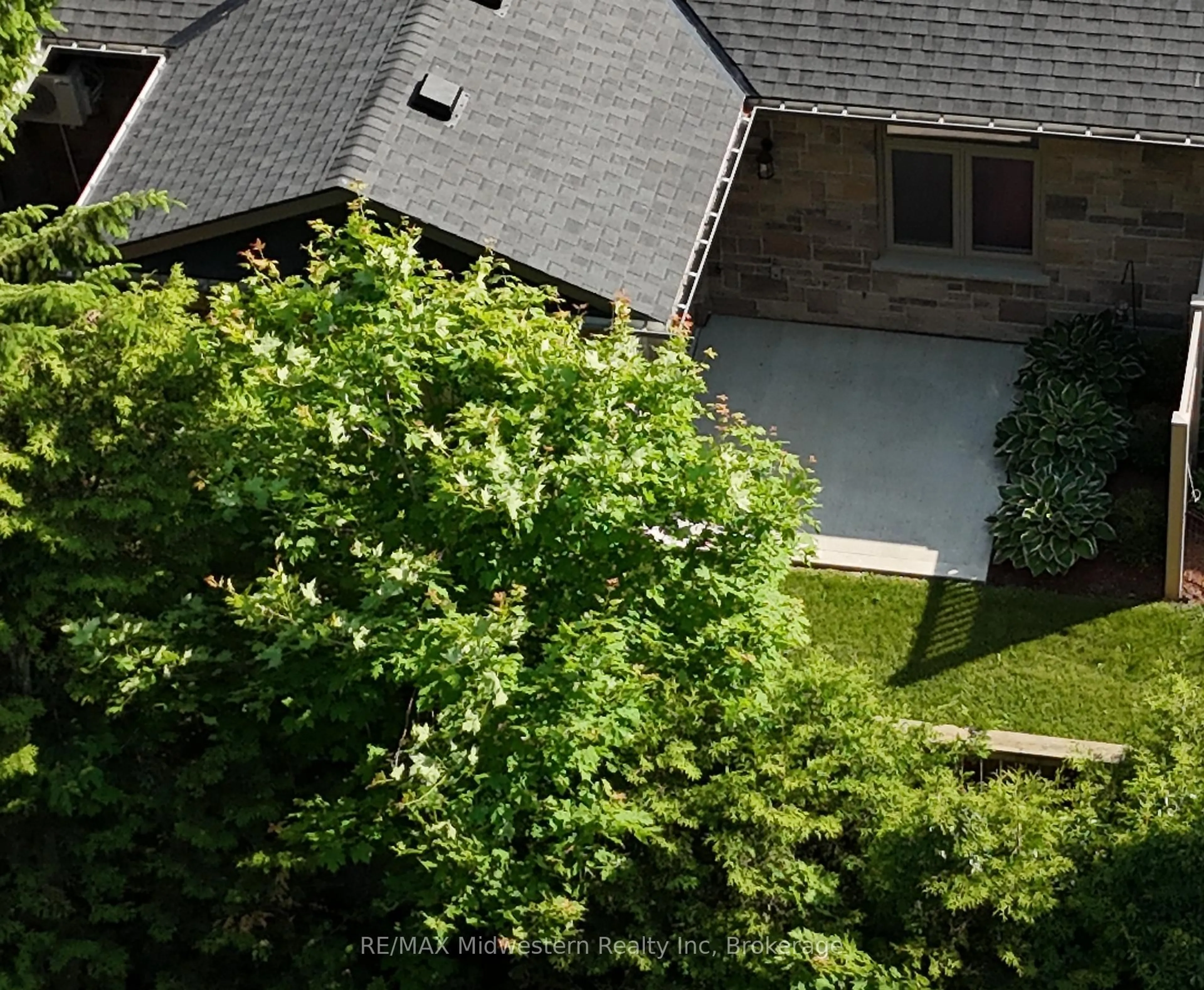 A pic from outside/outdoor area/front of a property/back of a property/a pic from drone, street for 375 Mitchell Rd ##71, North Perth Ontario N4W 0H4