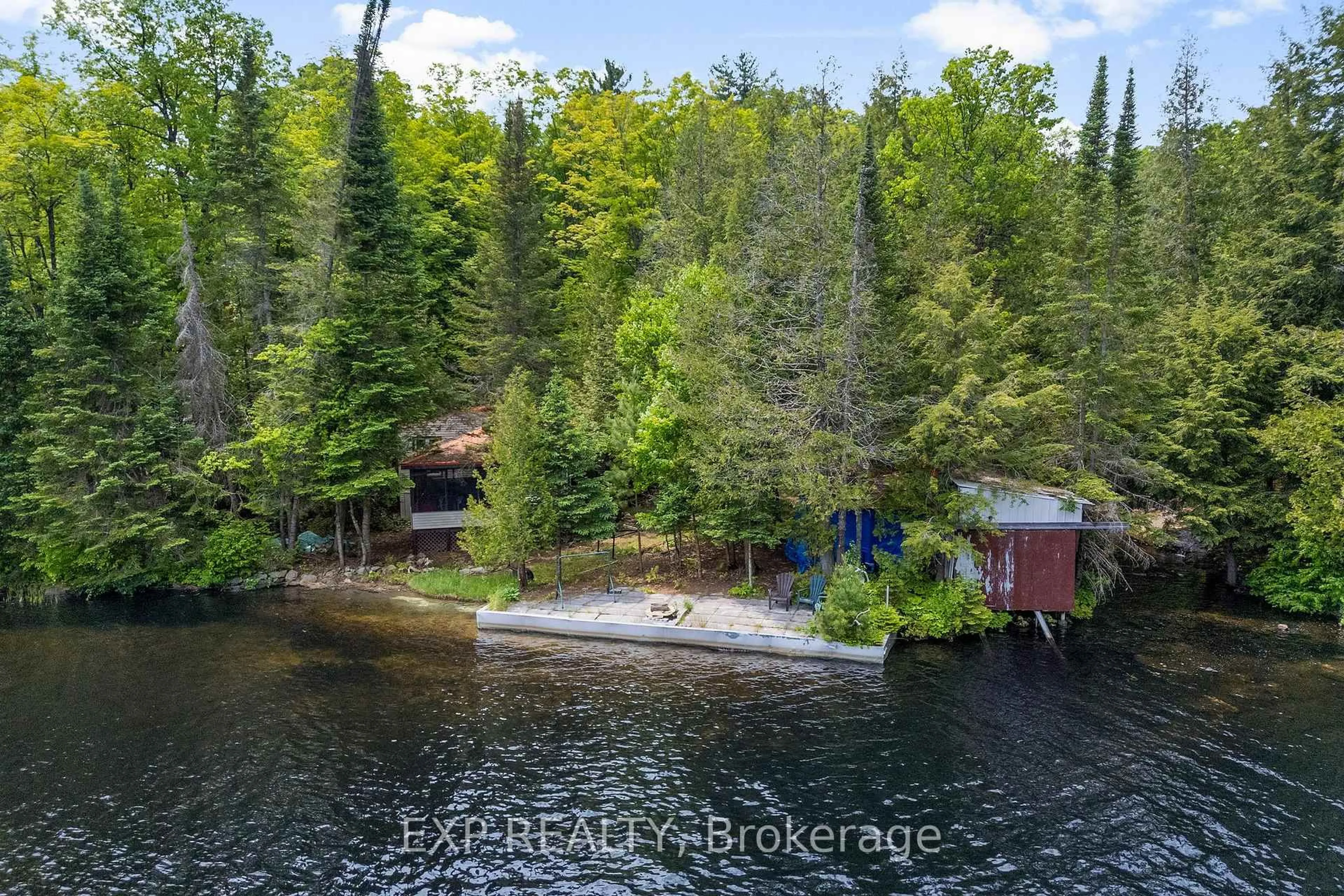 A pic from outside/outdoor area/front of a property/back of a property/a pic from drone, water/lake/river/ocean view for 1061-A Centennial Lake Rd, Calabogie Ontario K0J 1H0