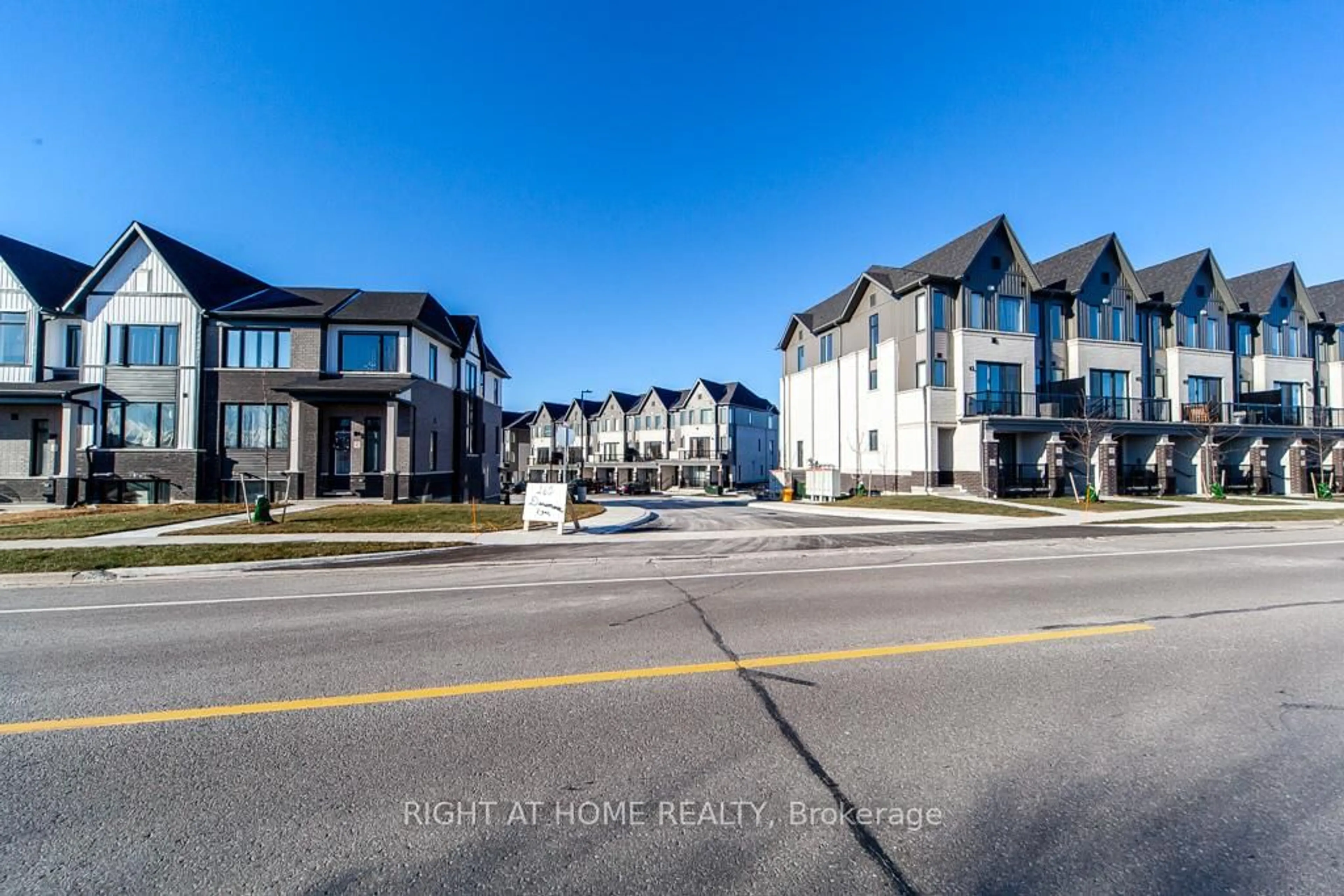 A pic from outside/outdoor area/front of a property/back of a property/a pic from drone, street for 160 Densmore Rd #2104, Cobourg Ontario K9A 0X8