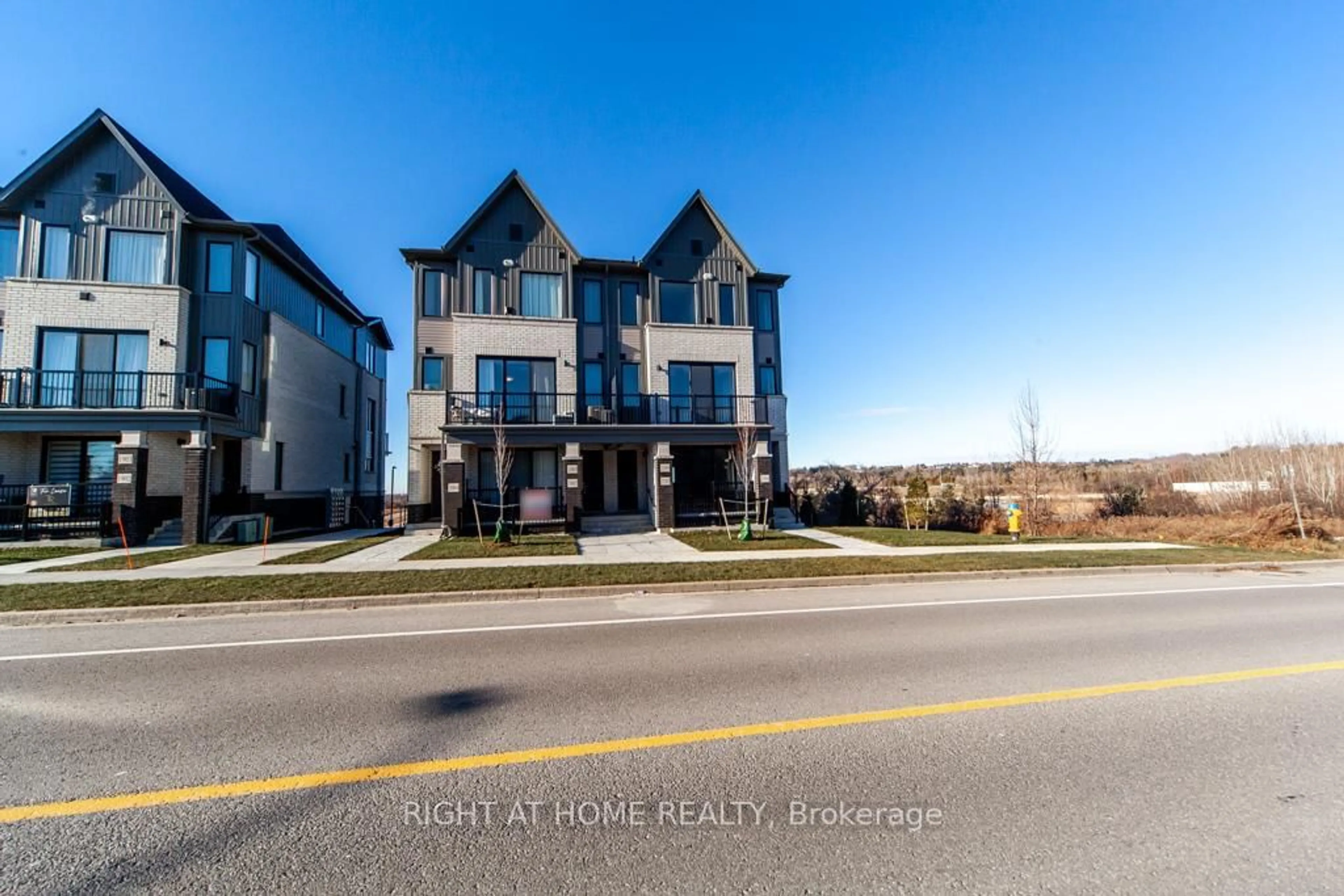 A pic from outside/outdoor area/front of a property/back of a property/a pic from drone, unknown for 160 Densmore Rd #2104, Cobourg Ontario K9A 0X8