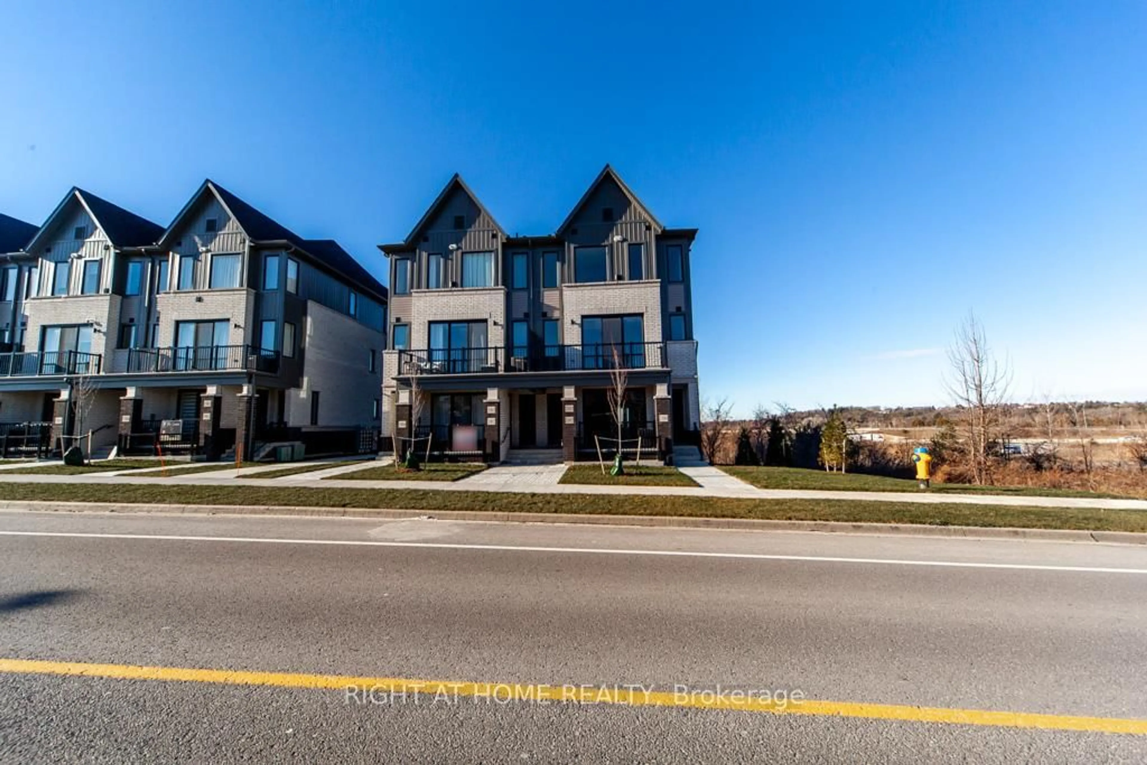 A pic from outside/outdoor area/front of a property/back of a property/a pic from drone, street for 160 Densmore Rd #2104, Cobourg Ontario K9A 0X8