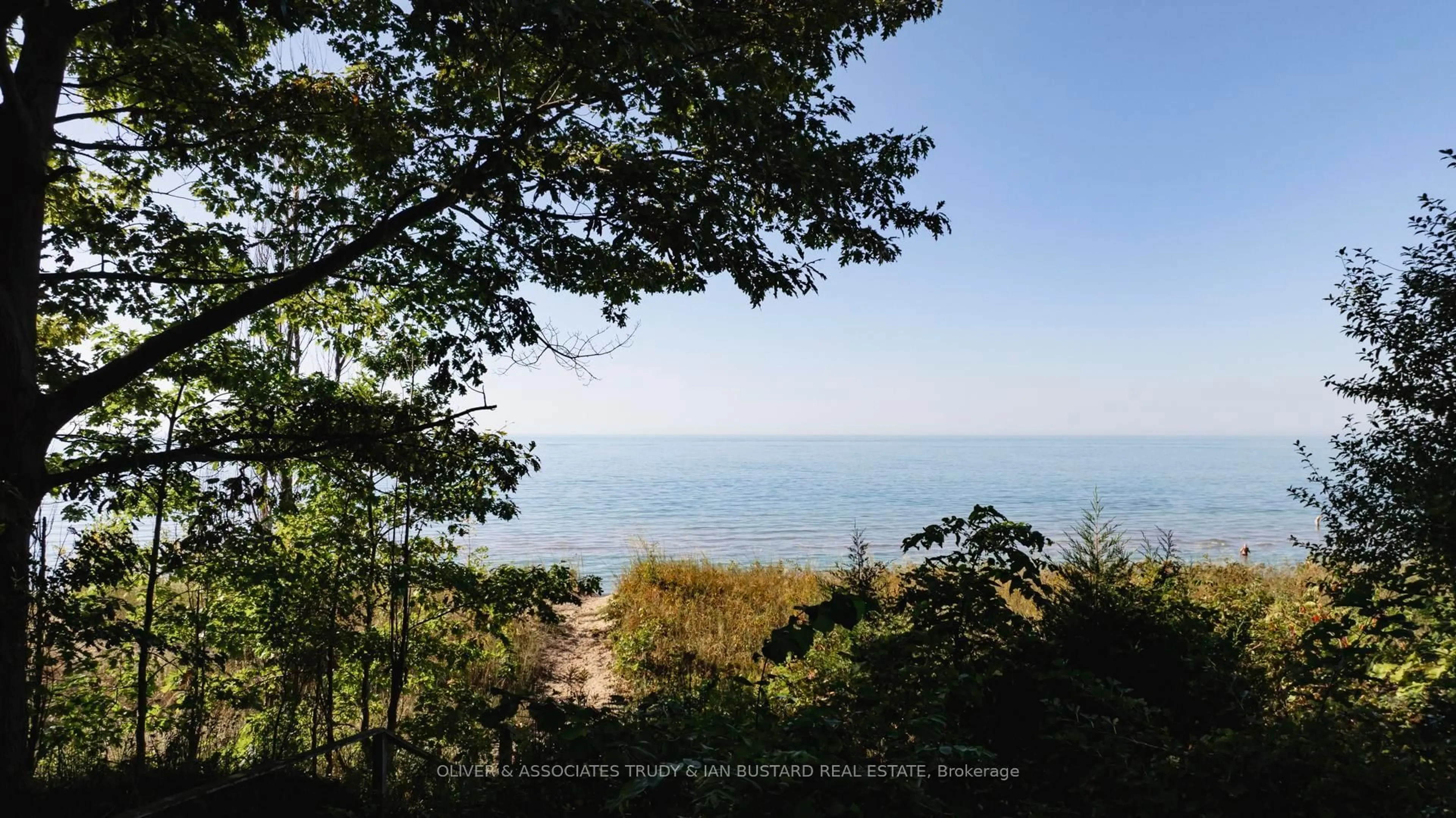 A pic from outside/outdoor area/front of a property/back of a property/a pic from drone, water/lake/river/ocean view for 33 Lakeshore Dr, South Huron Ontario N0M 1T0