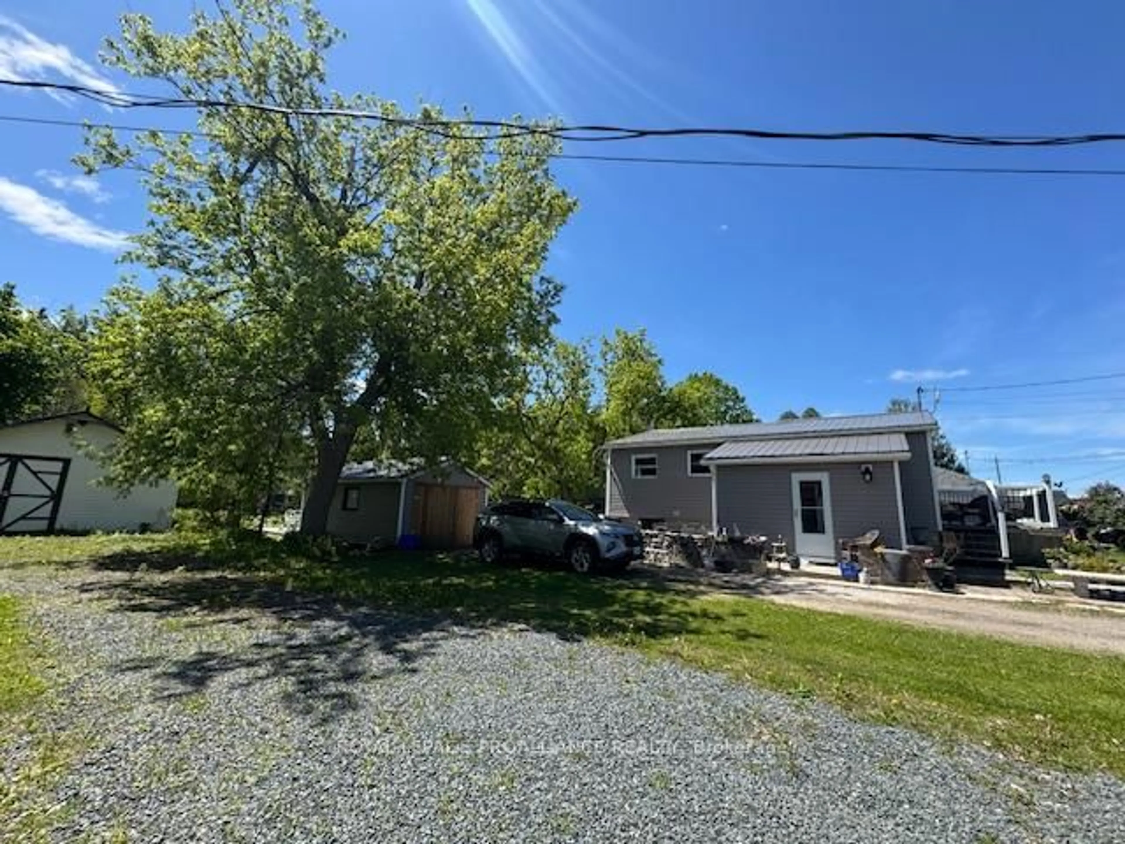 A pic from outside/outdoor area/front of a property/back of a property/a pic from drone, street for 217 Norwood Rd, Limoges Ontario K0K 2M0