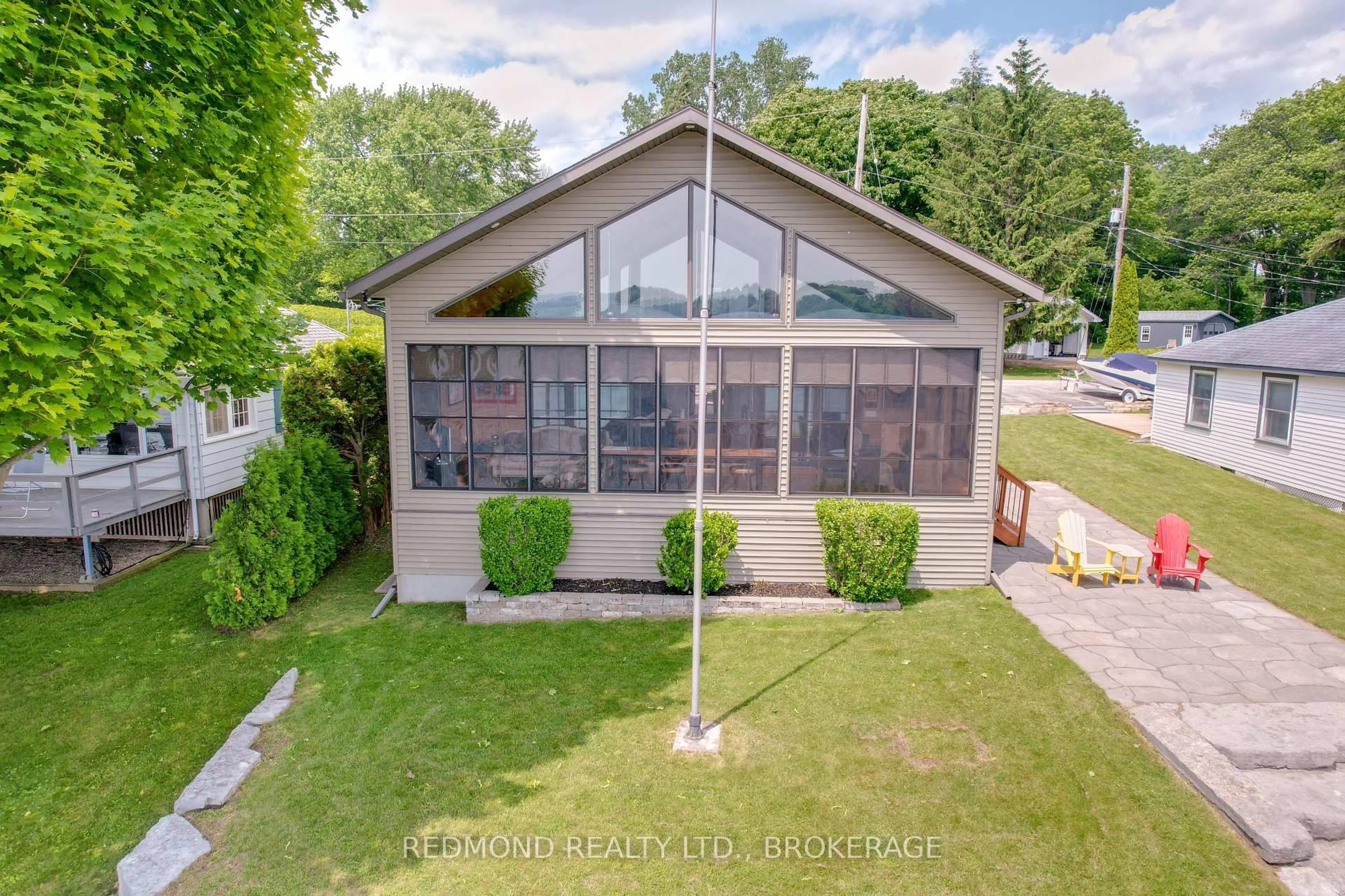 A pic from outside/outdoor area/front of a property/back of a property/a pic from drone, water/lake/river/ocean view for 105 Chisamore Point Rd, Front of Leeds & Seeleys Bay Ontario K7G 2V4