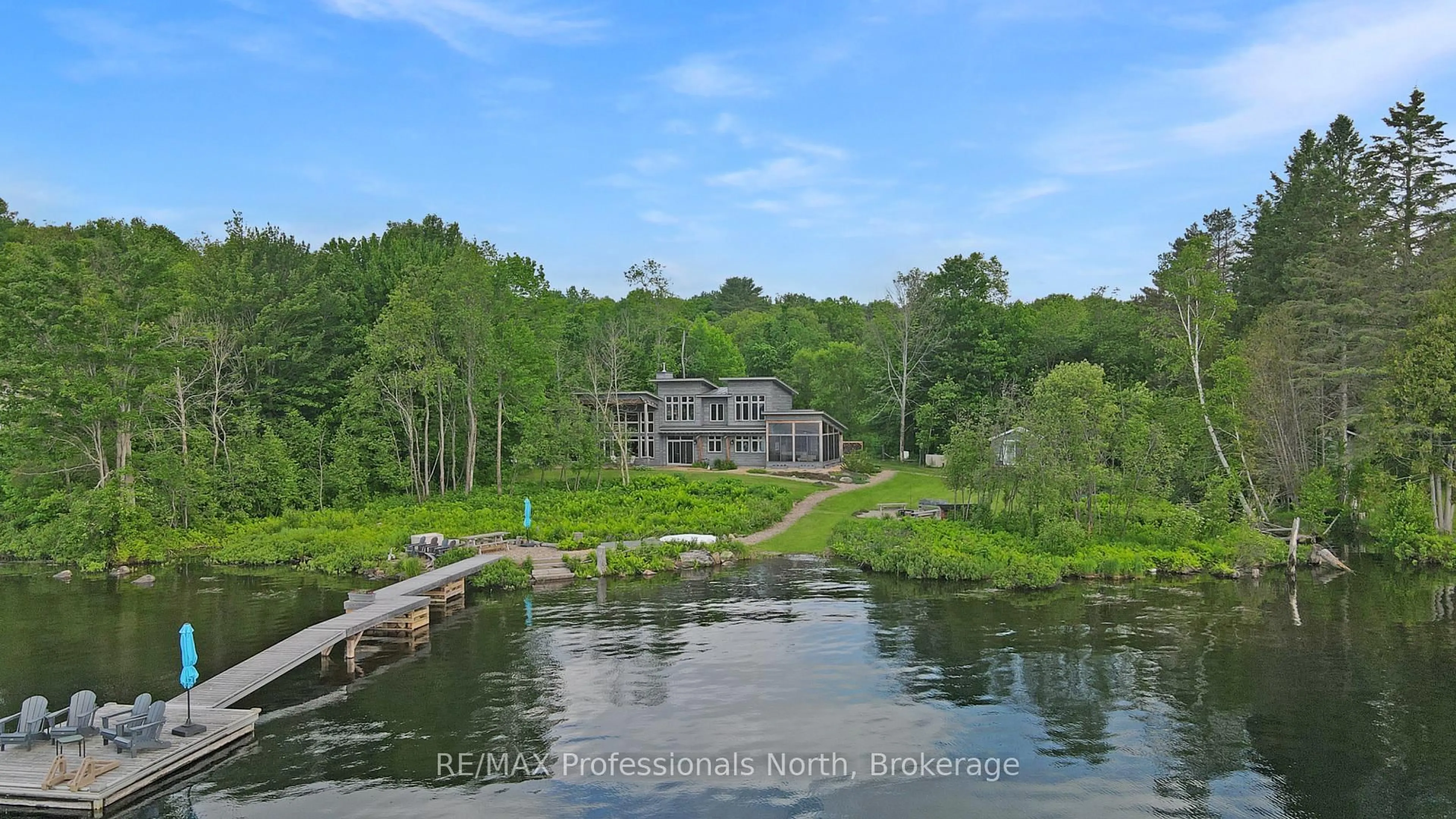 A pic from outside/outdoor area/front of a property/back of a property/a pic from drone, water/lake/river/ocean view for 1049 Twin Rocks Lane, Algonquin Highlands Ontario K0M 1S0