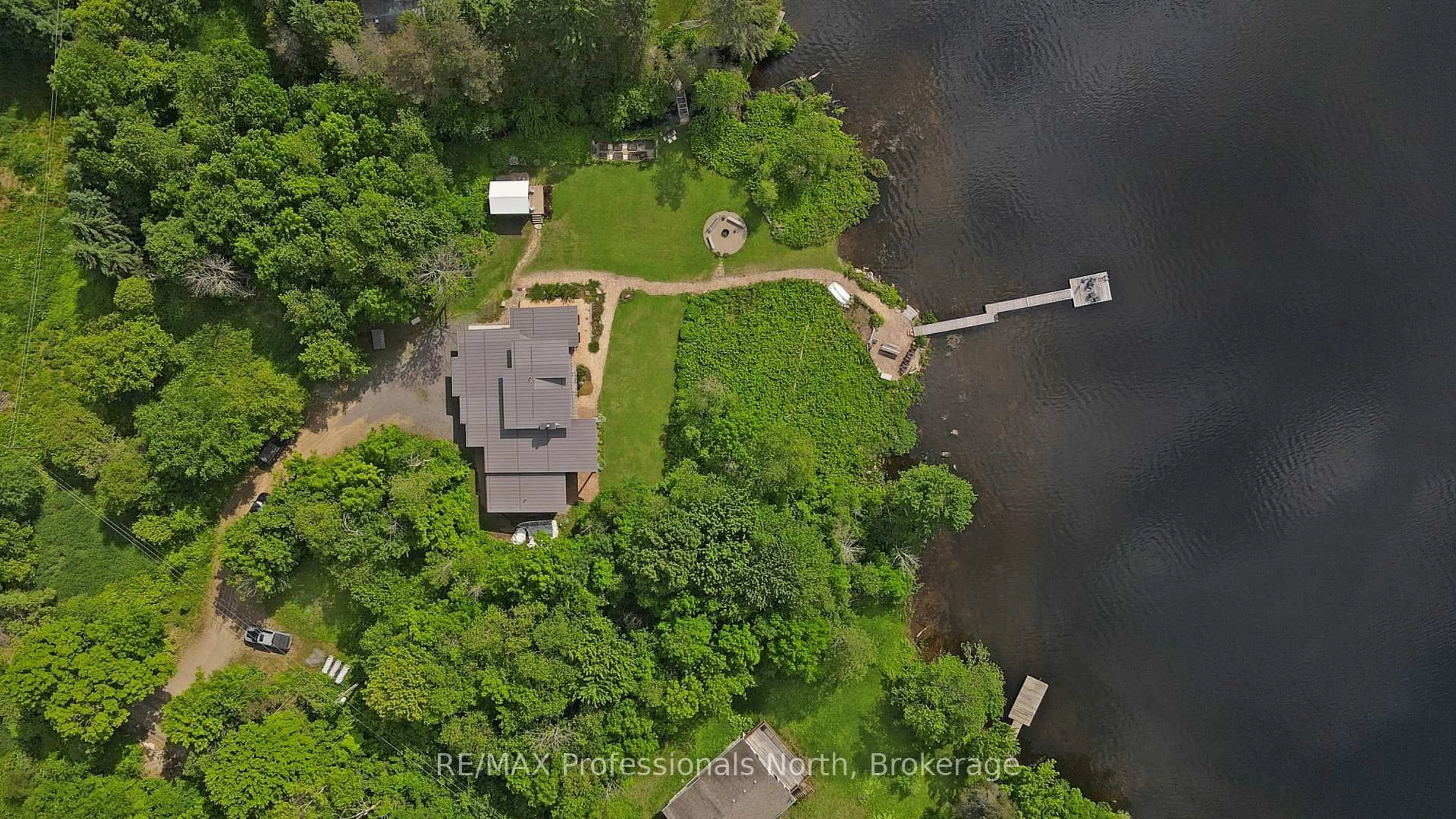 A pic from outside/outdoor area/front of a property/back of a property/a pic from drone, water/lake/river/ocean view for 1049 Twin Rocks Lane, Algonquin Highlands Ontario K0M 1S0