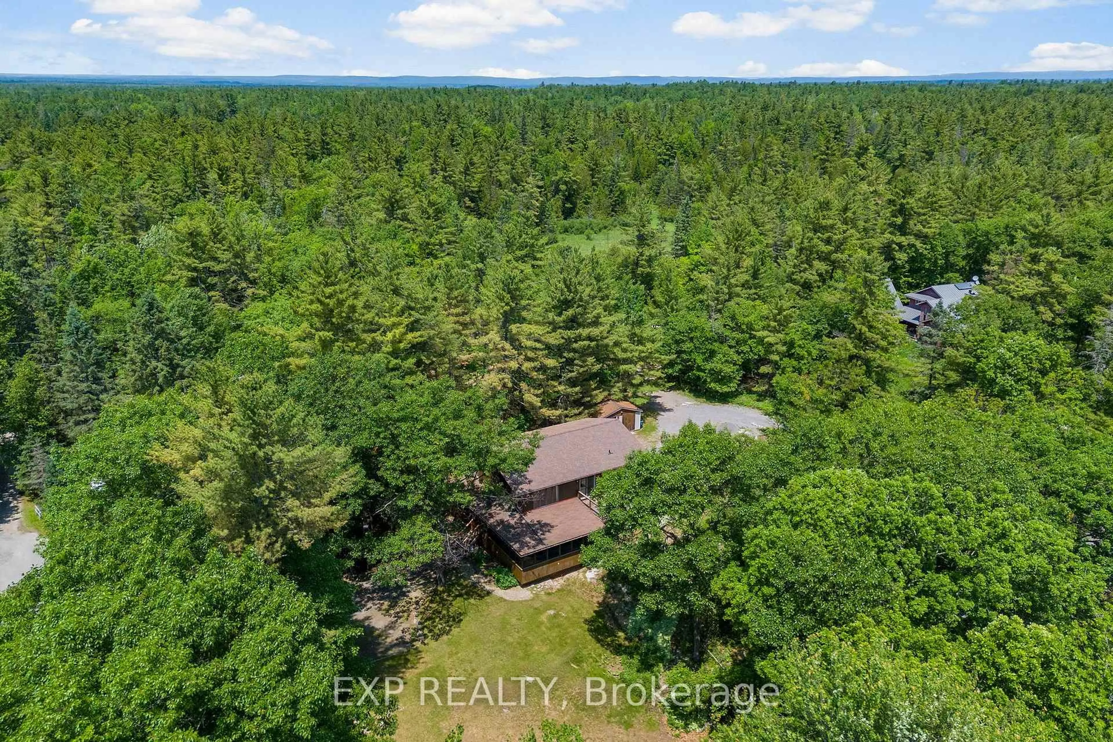 A pic from outside/outdoor area/front of a property/back of a property/a pic from drone, forest/trees view for 312 Mississippi Dr, Ottawa Ontario K7S 3G7
