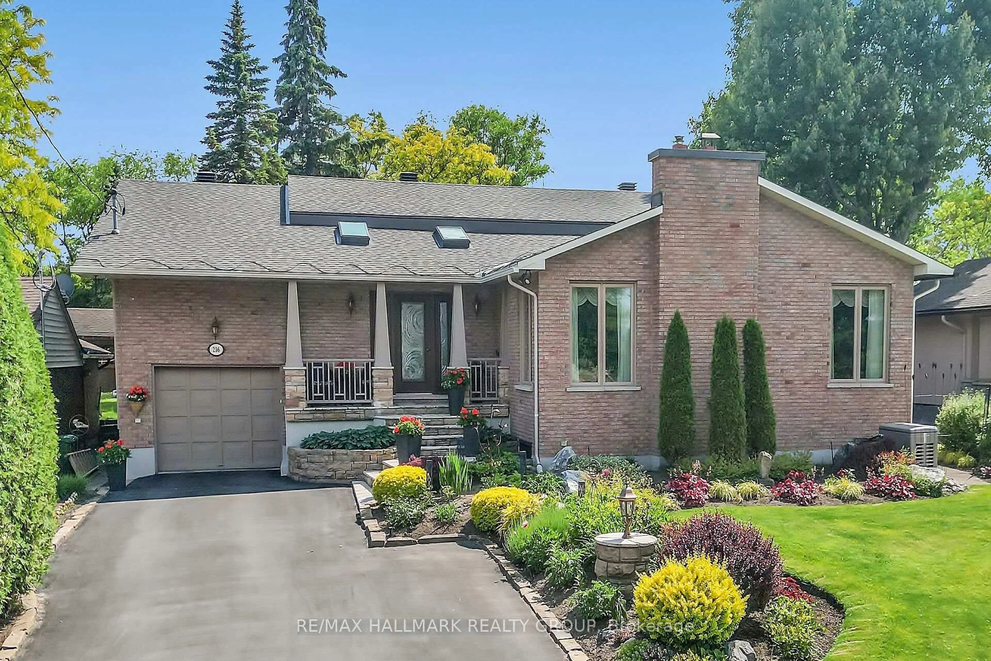 Home with brick exterior material, street for 216 Grandview Rd, Ottawa Ontario K2H 8A9