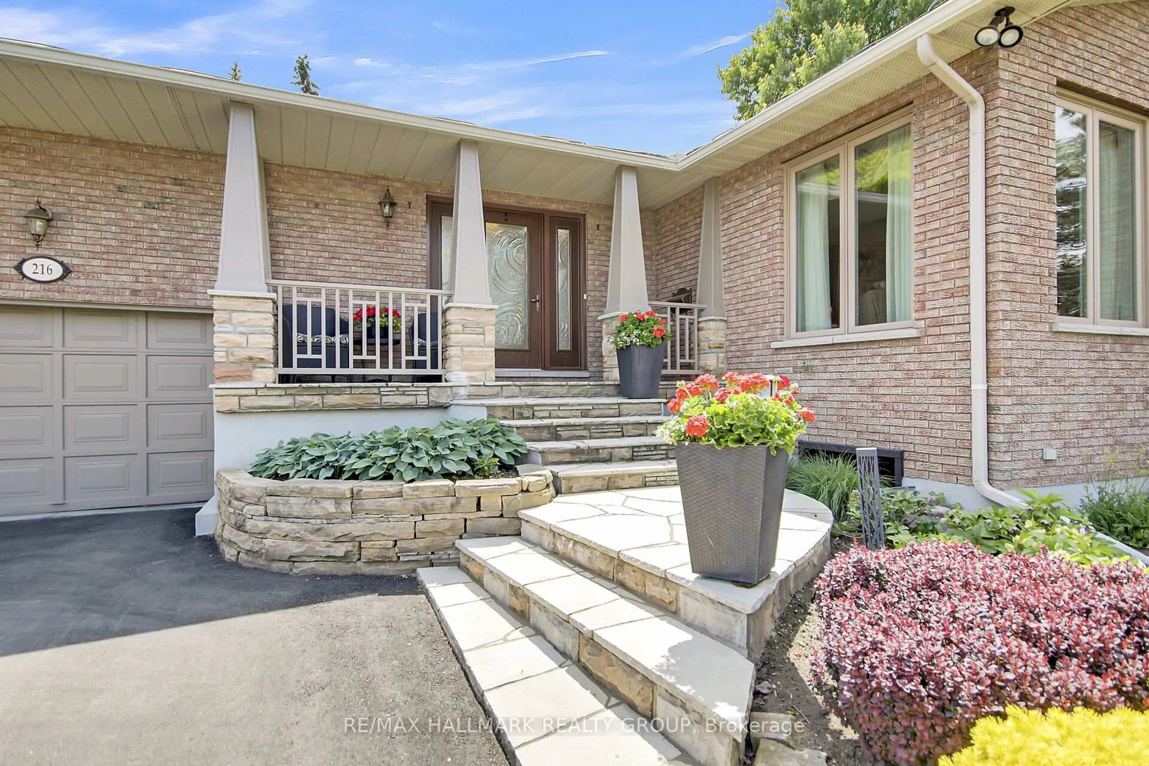 Home with brick exterior material, street for 216 Grandview Rd, Ottawa Ontario K2H 8A9