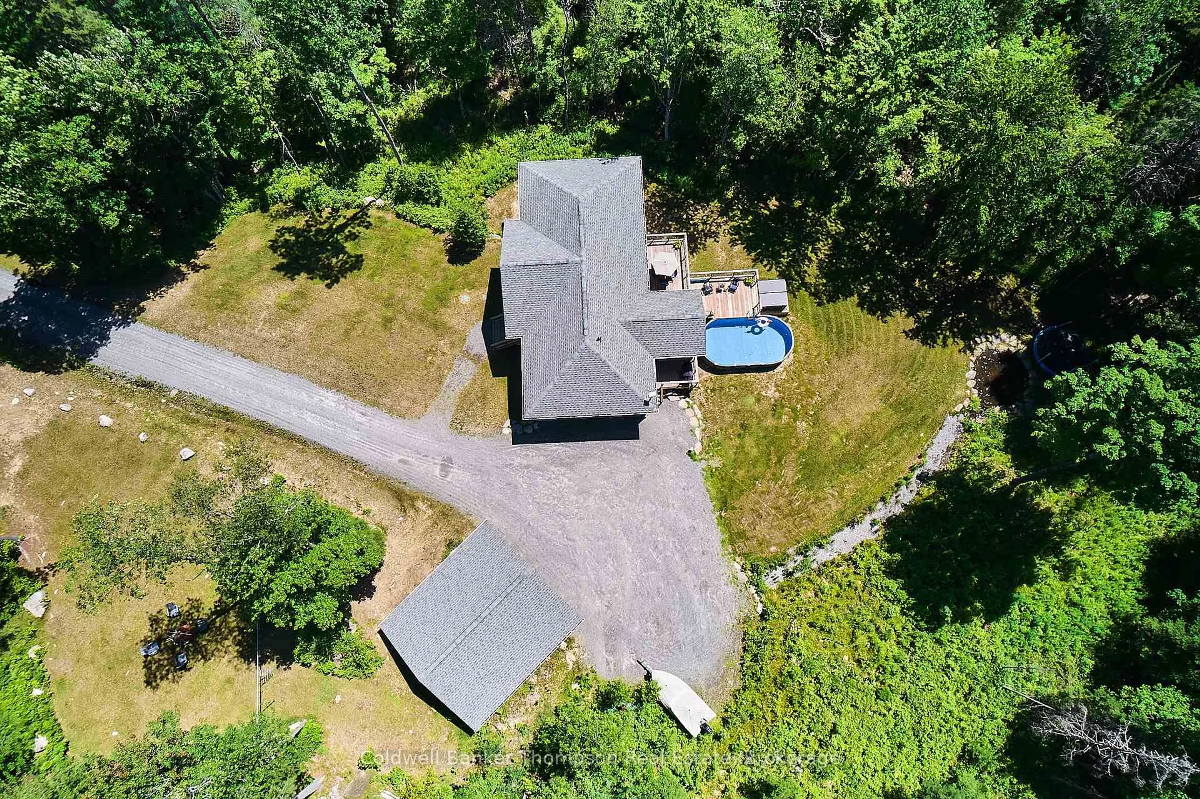A pic from outside/outdoor area/front of a property/back of a property/a pic from drone, unknown for 575 Britannia Rd, Huntsville Ontario P1H 2J3