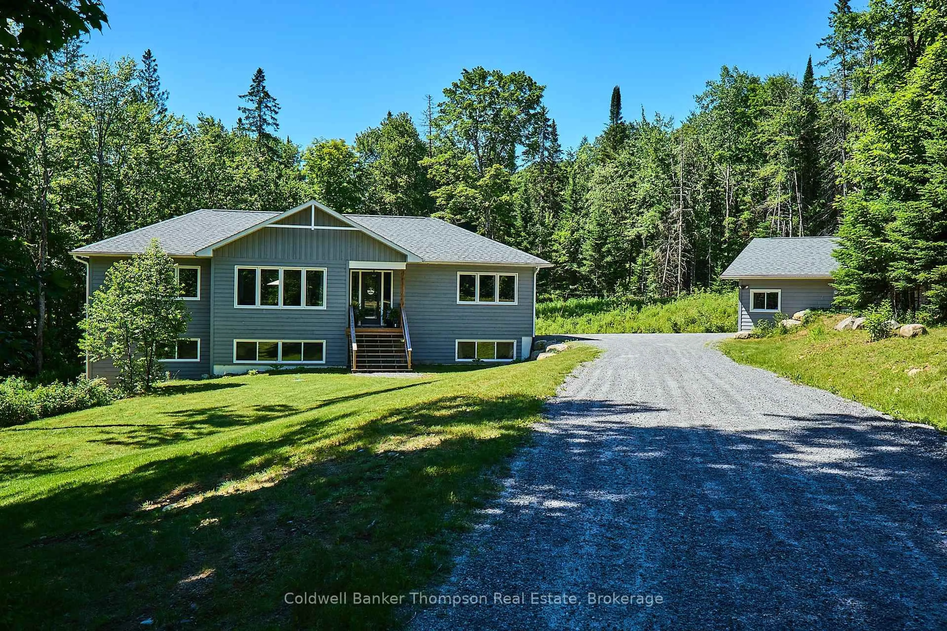 A pic from outside/outdoor area/front of a property/back of a property/a pic from drone, unknown for 575 Britannia Rd, Huntsville Ontario P1H 2J3