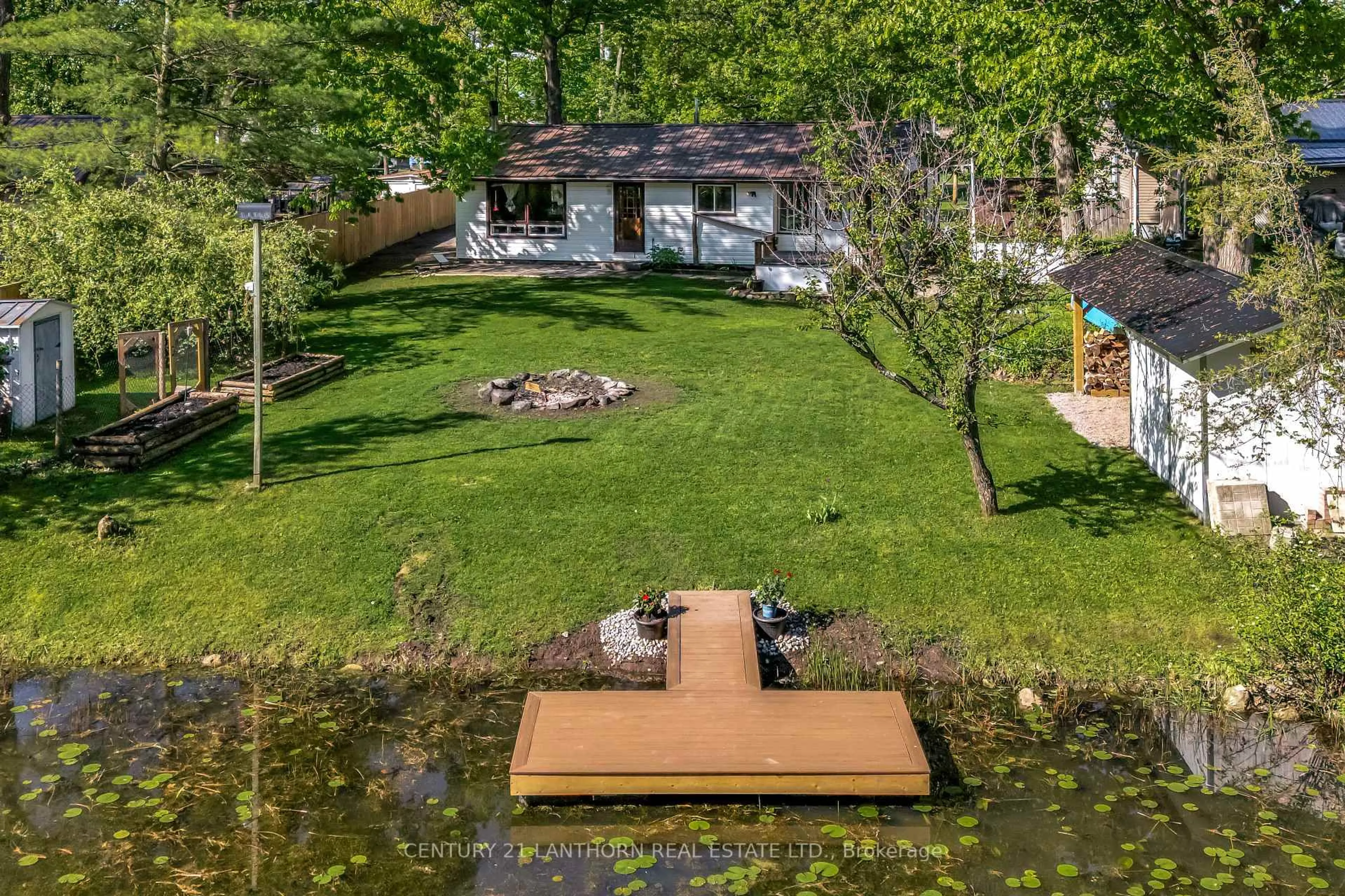 A pic from outside/outdoor area/front of a property/back of a property/a pic from drone, water/lake/river/ocean view for 202 River Rd, Trent Hills Ontario K0L 1L0