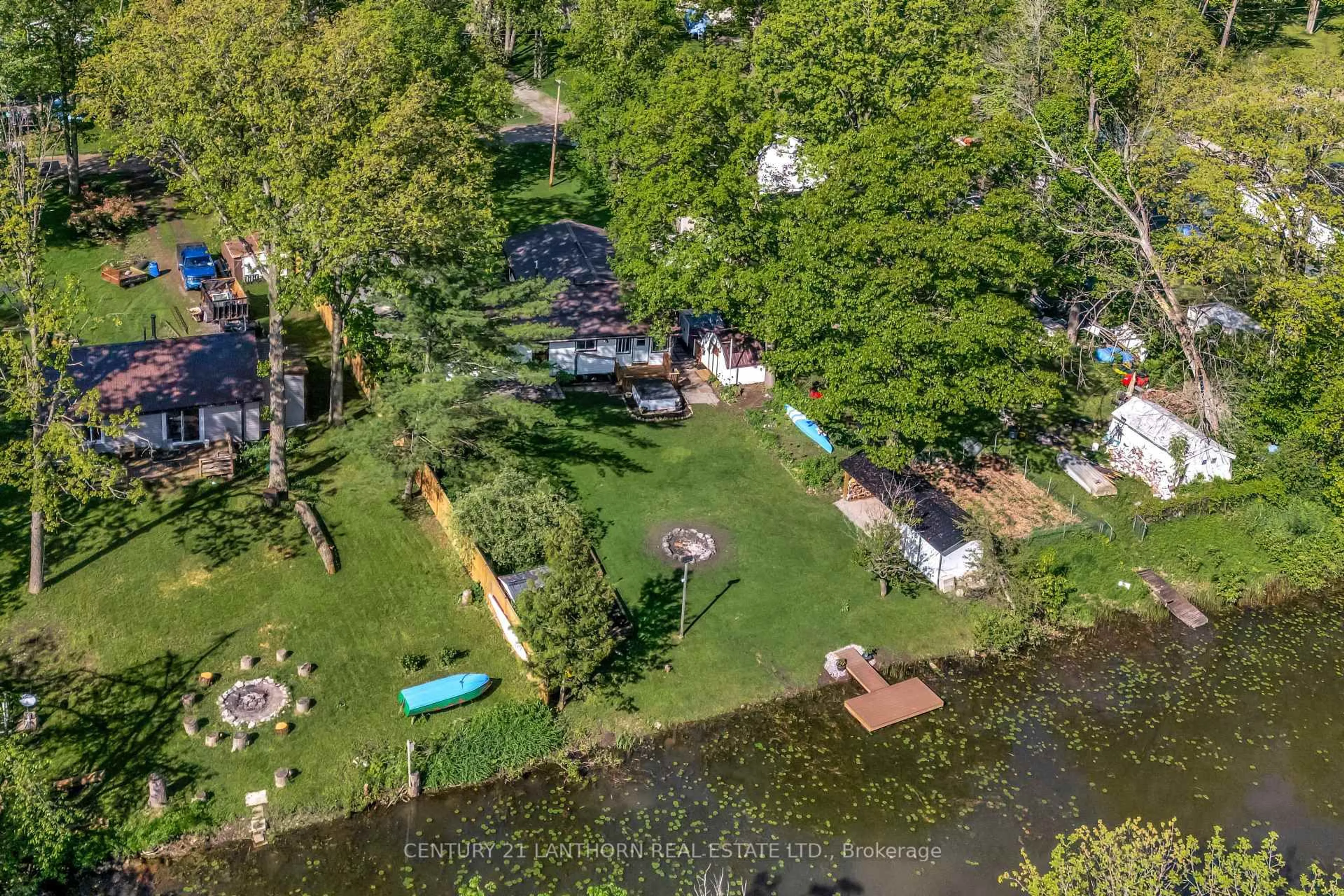 A pic from outside/outdoor area/front of a property/back of a property/a pic from drone, water/lake/river/ocean view for 202 River Rd, Trent Hills Ontario K0L 1L0