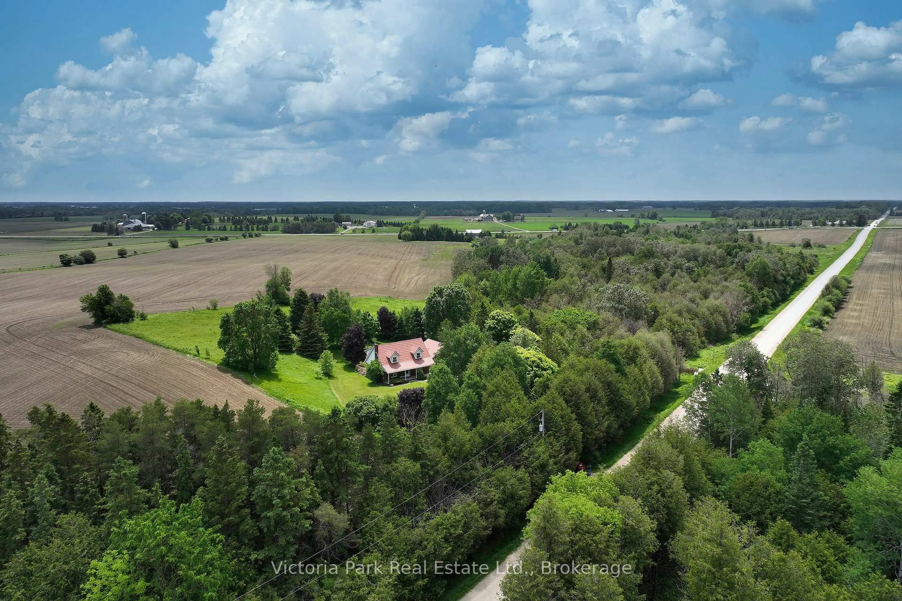 A pic from outside/outdoor area/front of a property/back of a property/a pic from drone, forest/trees view for 7135 3 Sdrd, Wellington North Ontario N0G 2L0