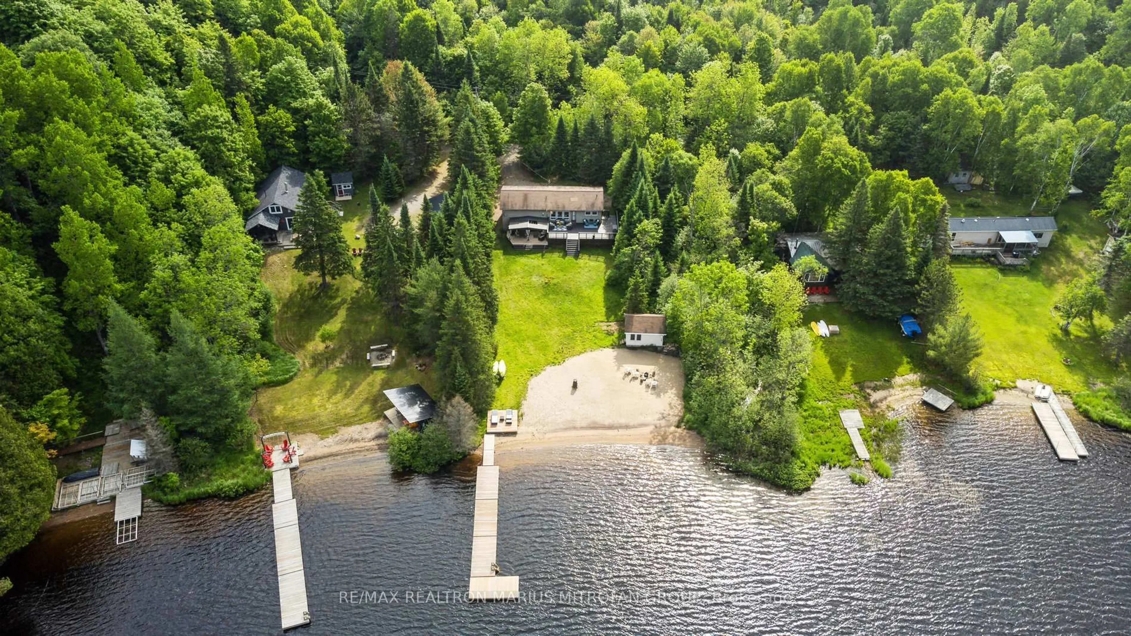 A pic from outside/outdoor area/front of a property/back of a property/a pic from drone, water/lake/river/ocean view for 344 East Whalley Lake Rd, Magnetawan Ontario P0A 1P0