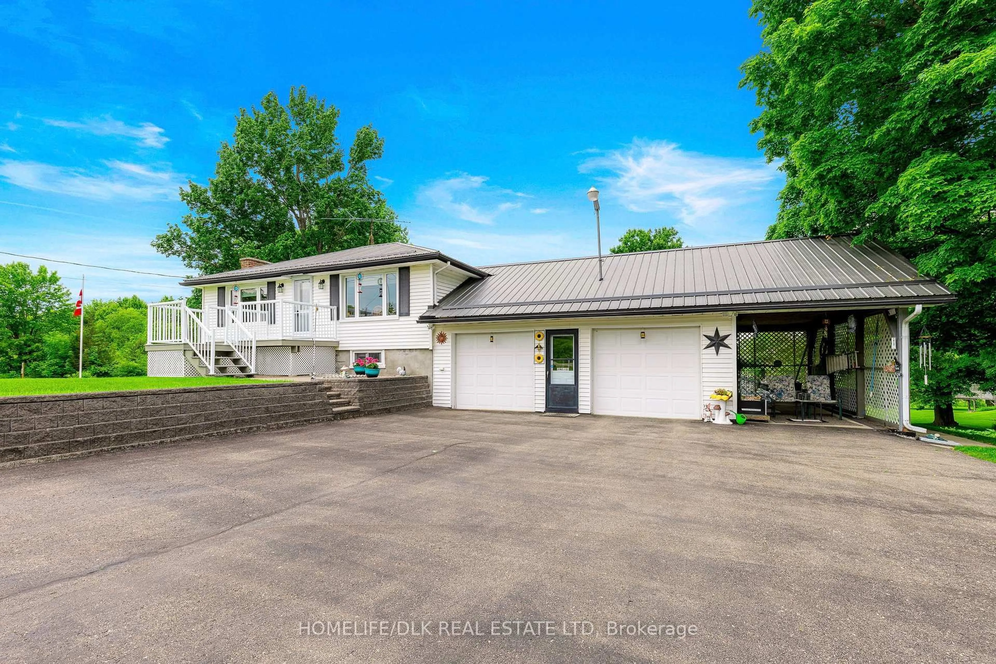 A pic from outside/outdoor area/front of a property/back of a property/a pic from drone, unknown for 1682 County Rd 2 Rd, Front of Yonge Ontario K0E 1R0