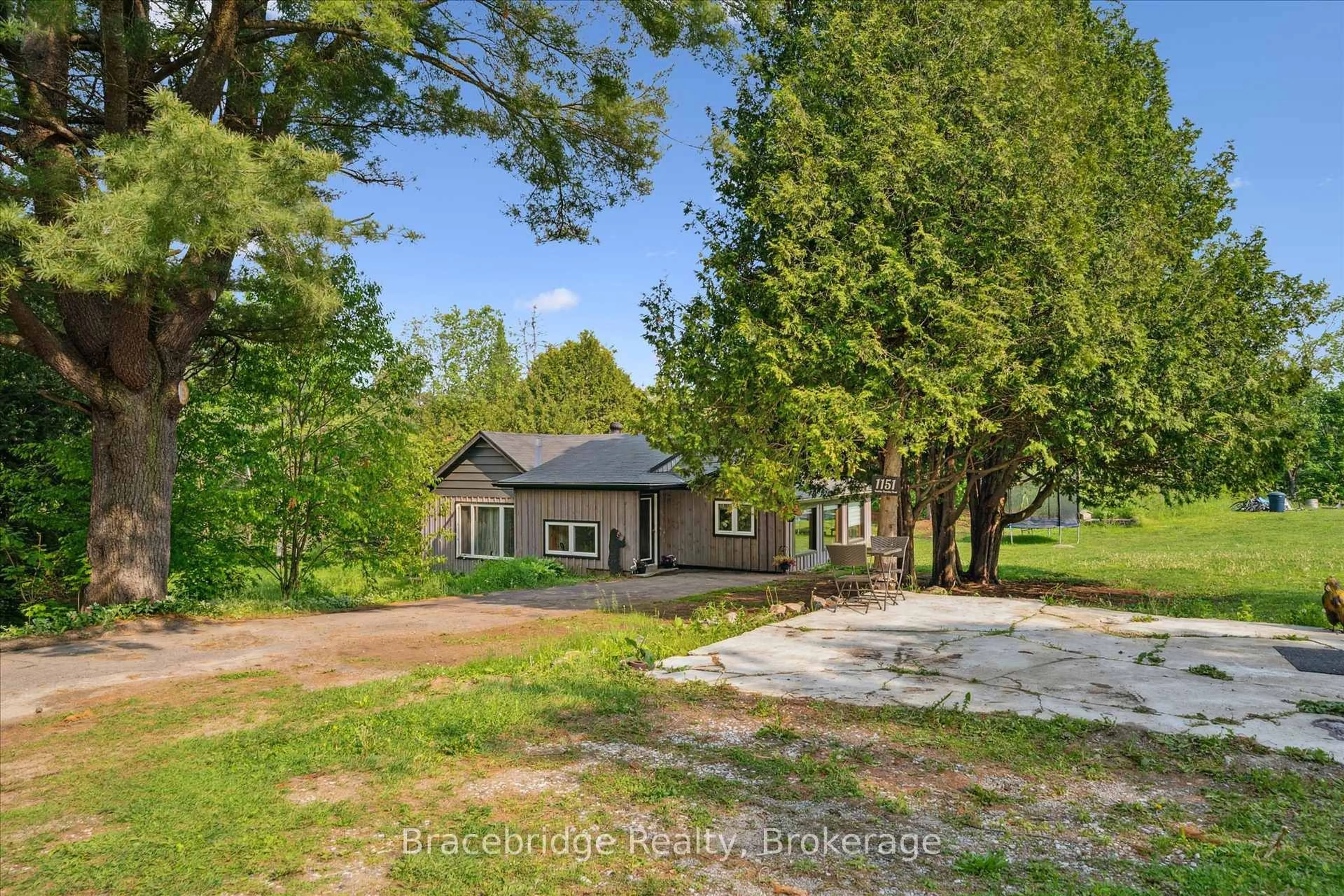 A pic from outside/outdoor area/front of a property/back of a property/a pic from drone, unknown for 1151 Beatrice Town Line, Bracebridge Ontario P1L 1X4