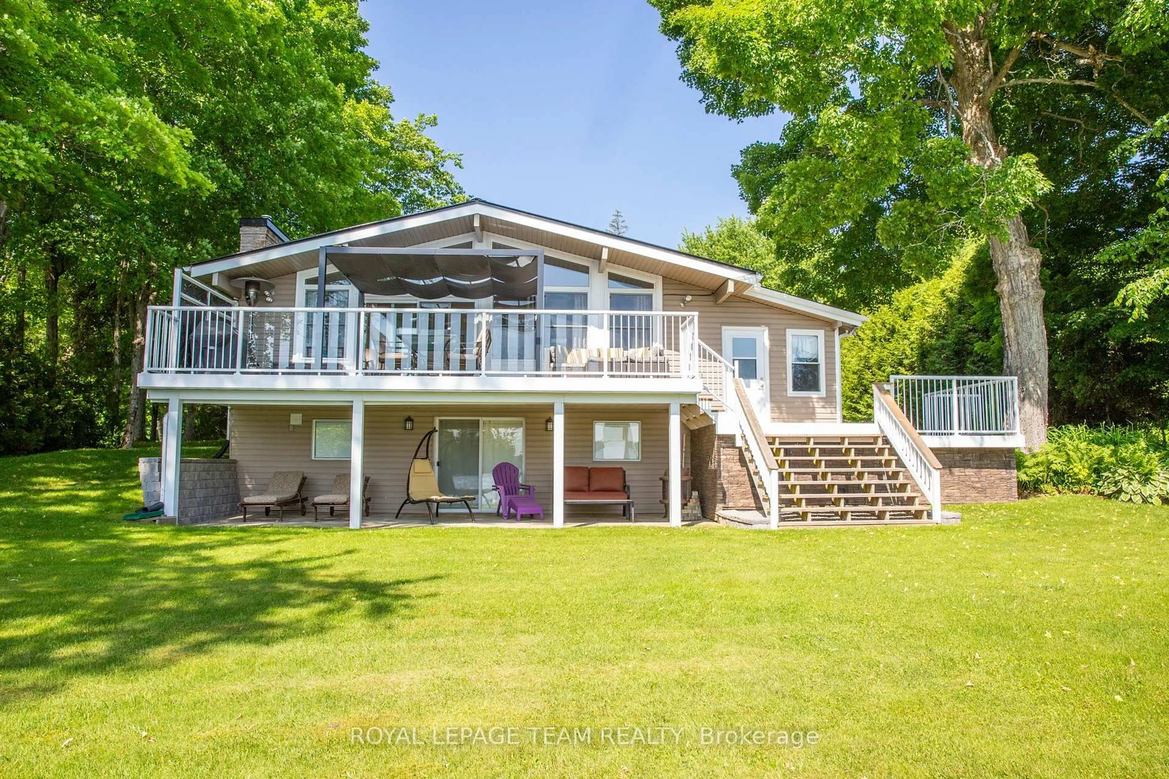 A pic from outside/outdoor area/front of a property/back of a property/a pic from drone, water/lake/river/ocean view for 1410 Wagner Rd, Sharbot Lake Ontario K0H 2P0