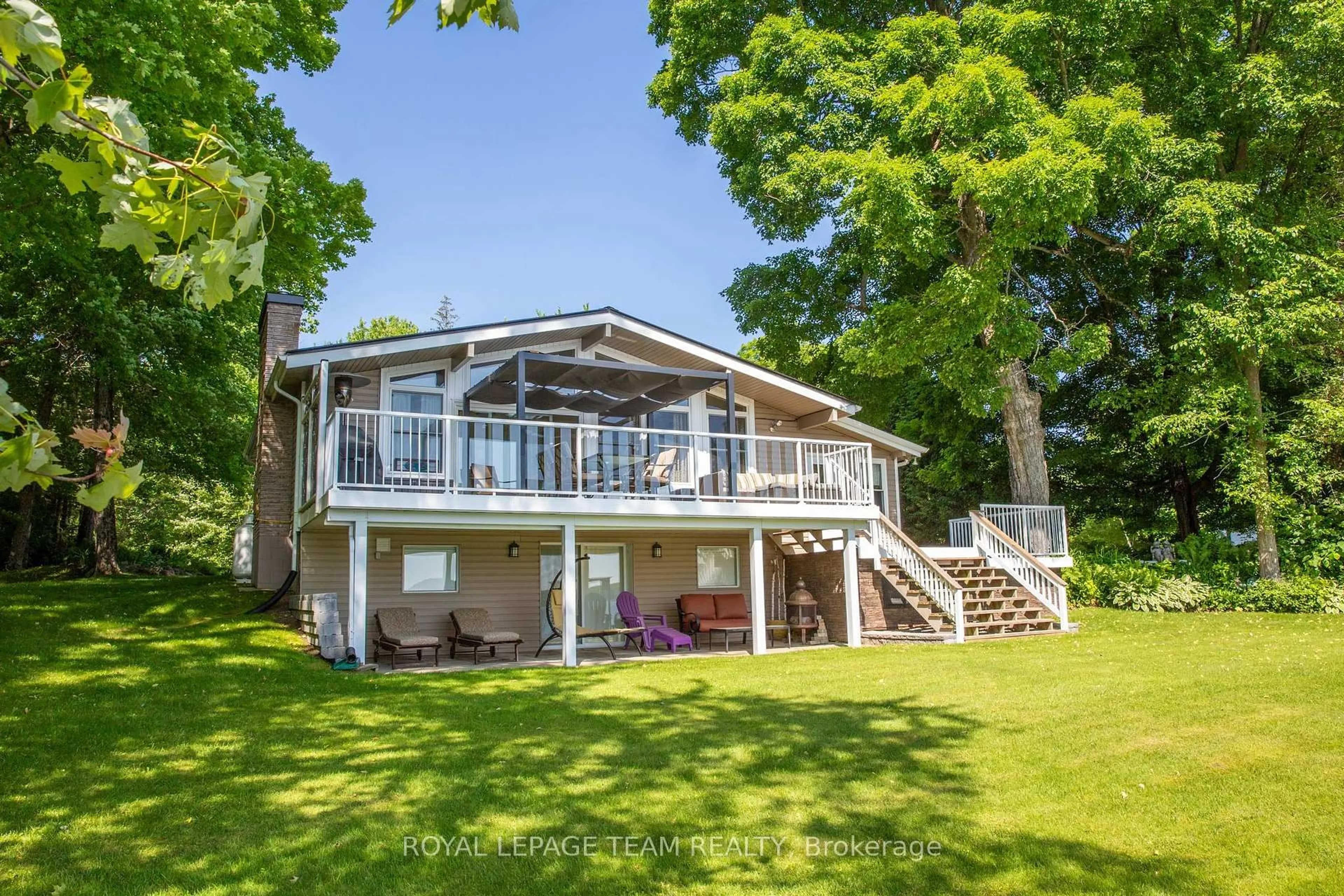 A pic from outside/outdoor area/front of a property/back of a property/a pic from drone, water/lake/river/ocean view for 1410 Wagner Rd, Sharbot Lake Ontario K0H 2P0