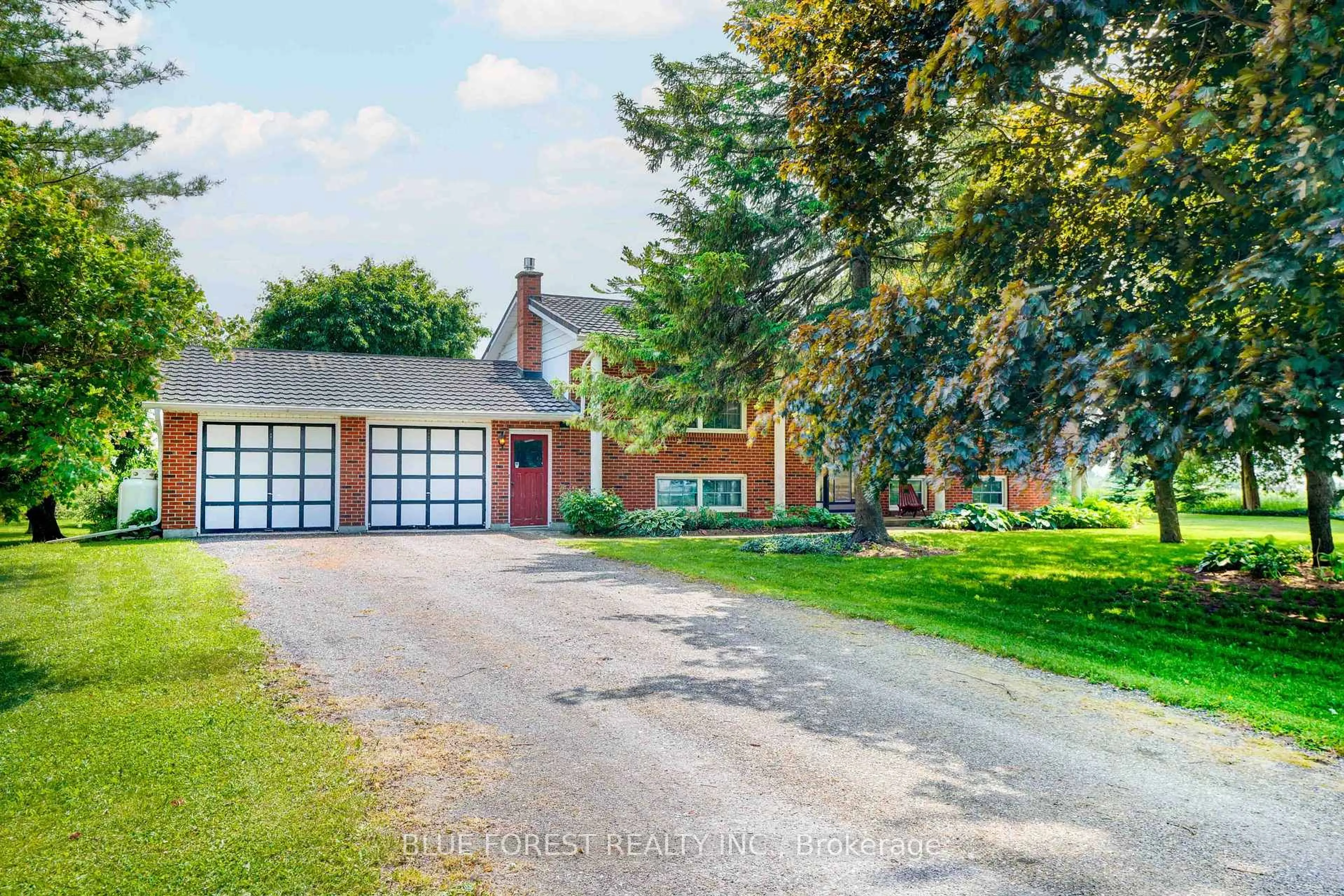 A pic from outside/outdoor area/front of a property/back of a property/a pic from drone, street for 14683 Fourteen Mile Rd, Middlesex Centre Ontario N0M 1P0