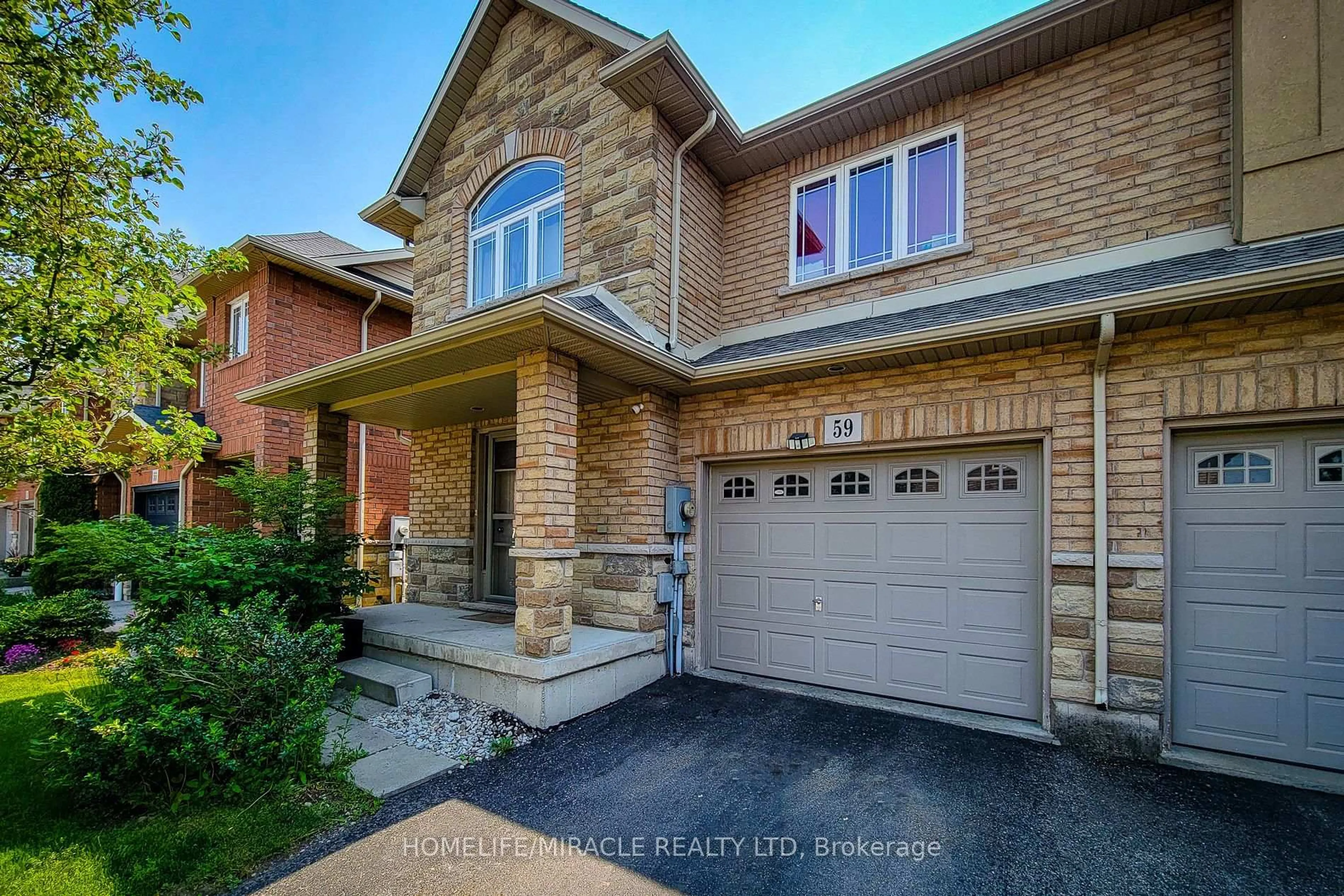Home with brick exterior material, street for 59 Periwinkle Dr, Hamilton Ontario L0R 1P0