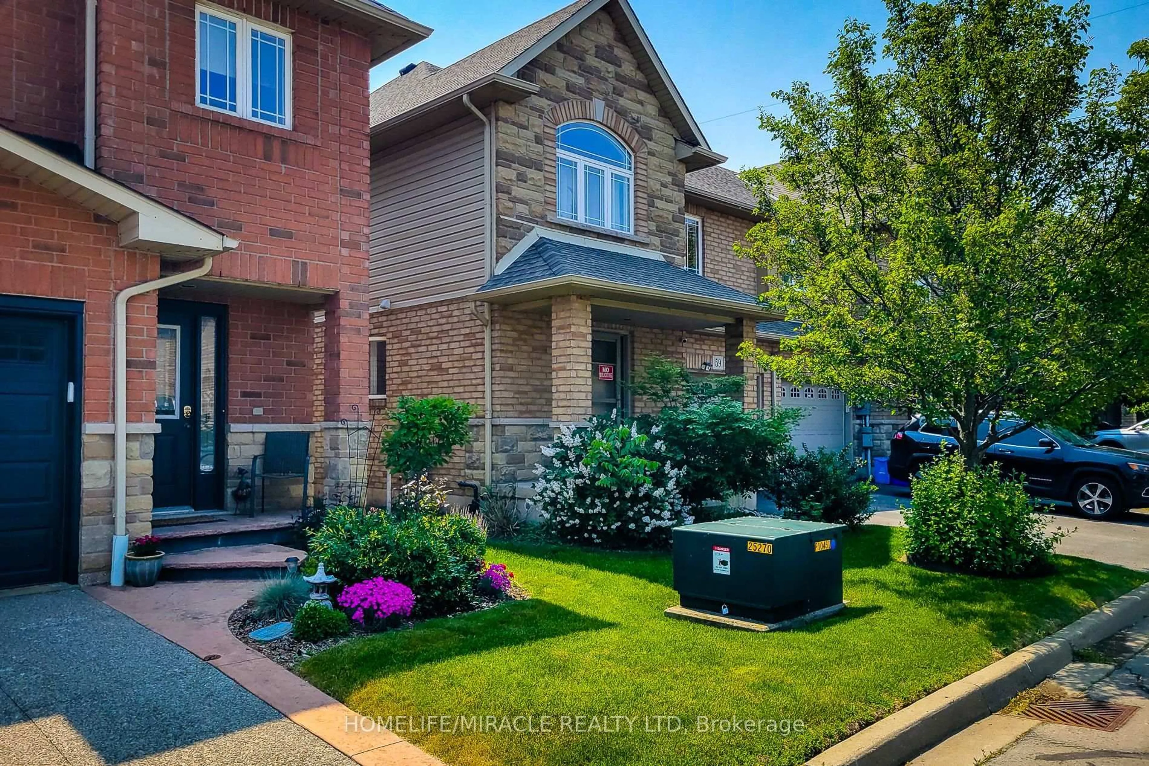 Home with brick exterior material, street for 59 Periwinkle Dr, Hamilton Ontario L0R 1P0