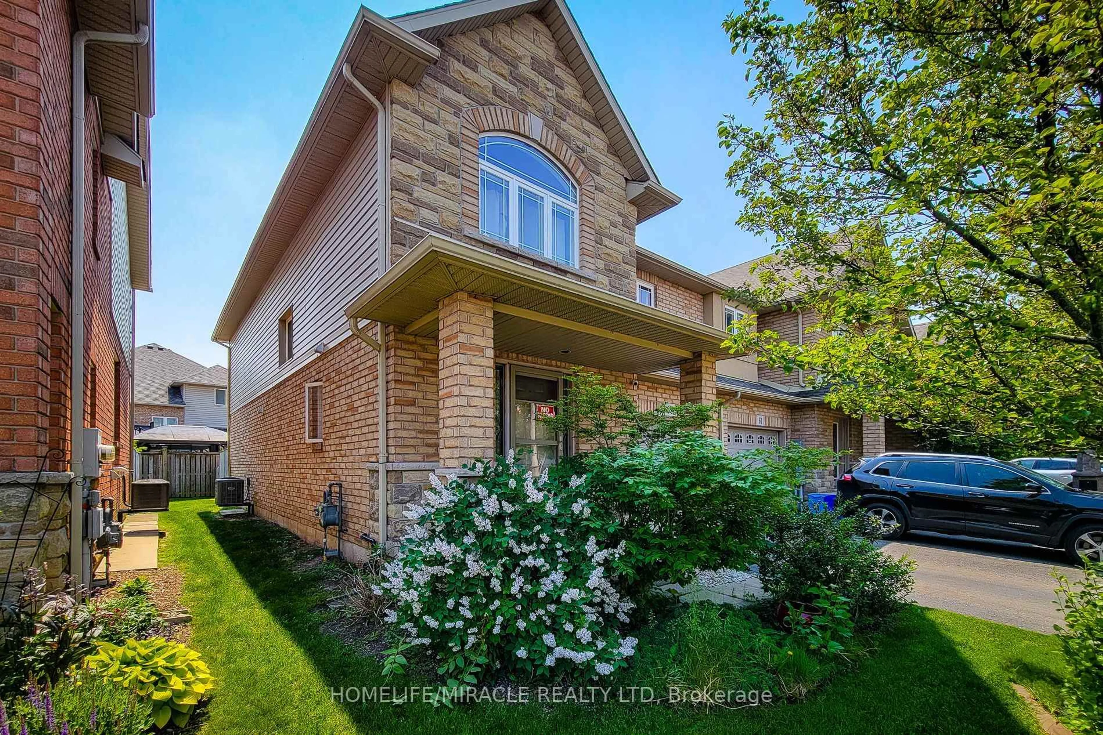 Home with brick exterior material, street for 59 Periwinkle Dr, Hamilton Ontario L0R 1P0