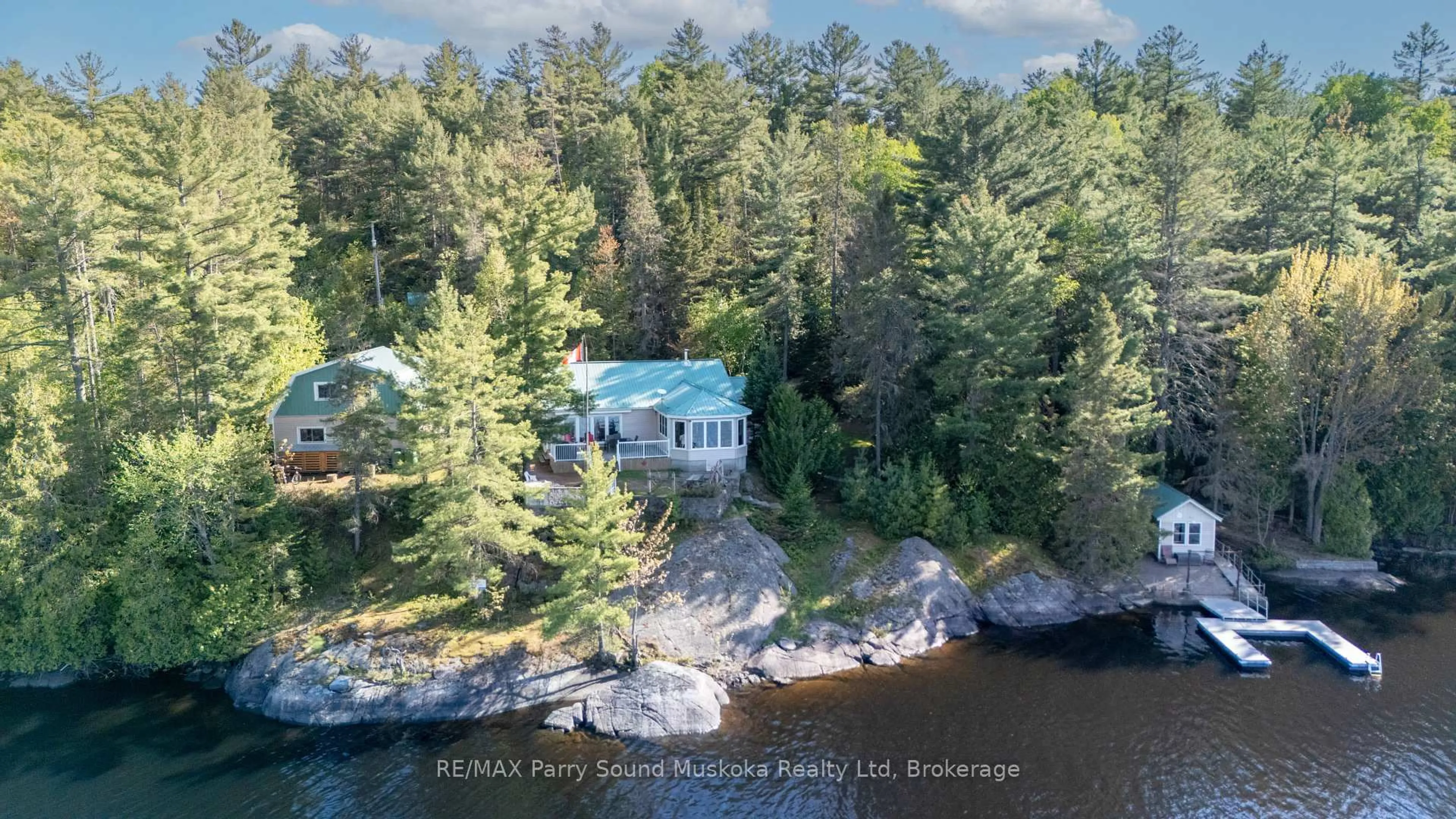 A pic from outside/outdoor area/front of a property/back of a property/a pic from drone, water/lake/river/ocean view for 667 Highway 528a Highway, French River Ontario P0M 2K0