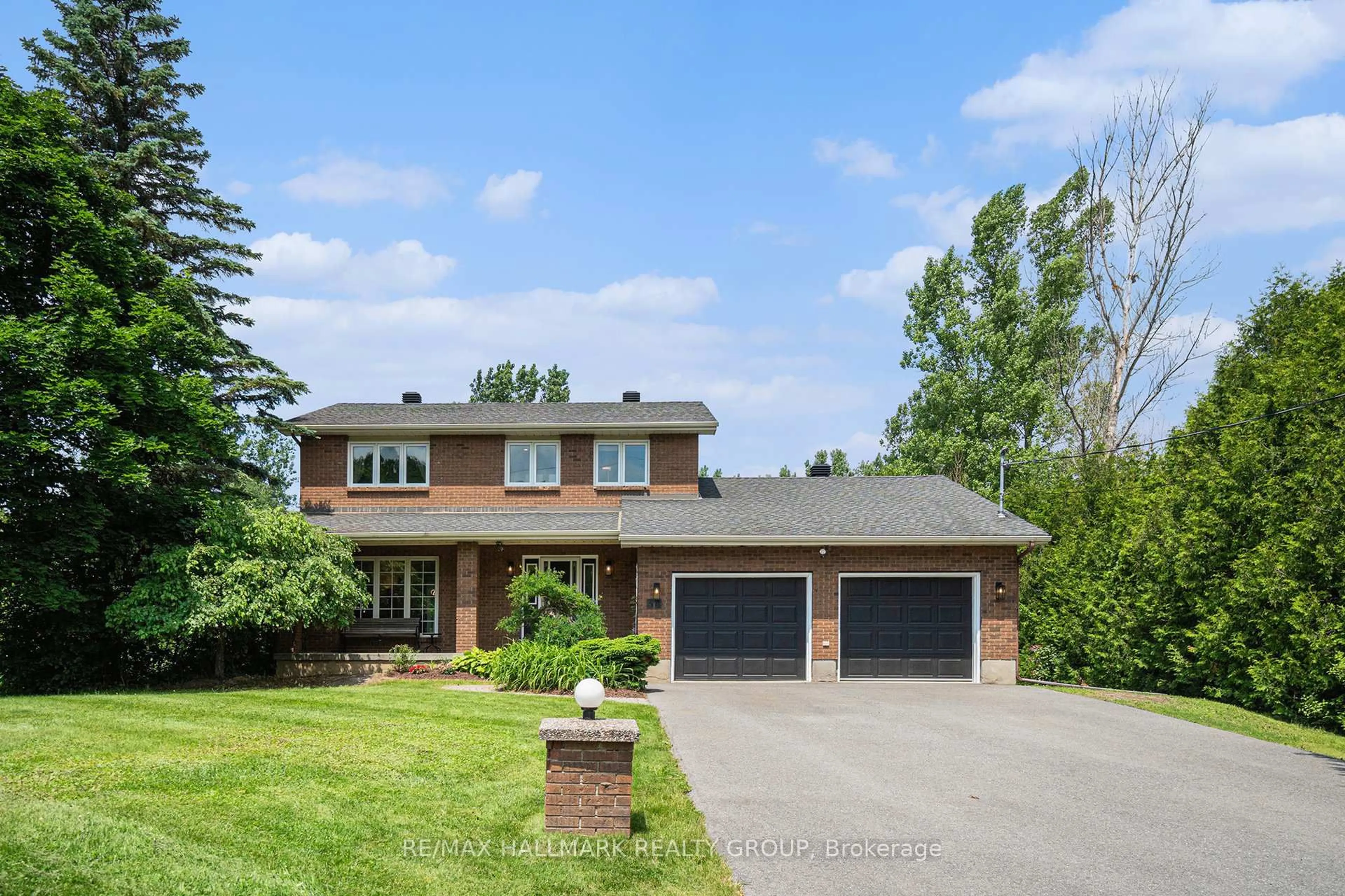 Home with brick exterior material, street for 34 Grierson Lane, Ottawa Ontario K2W 1A6