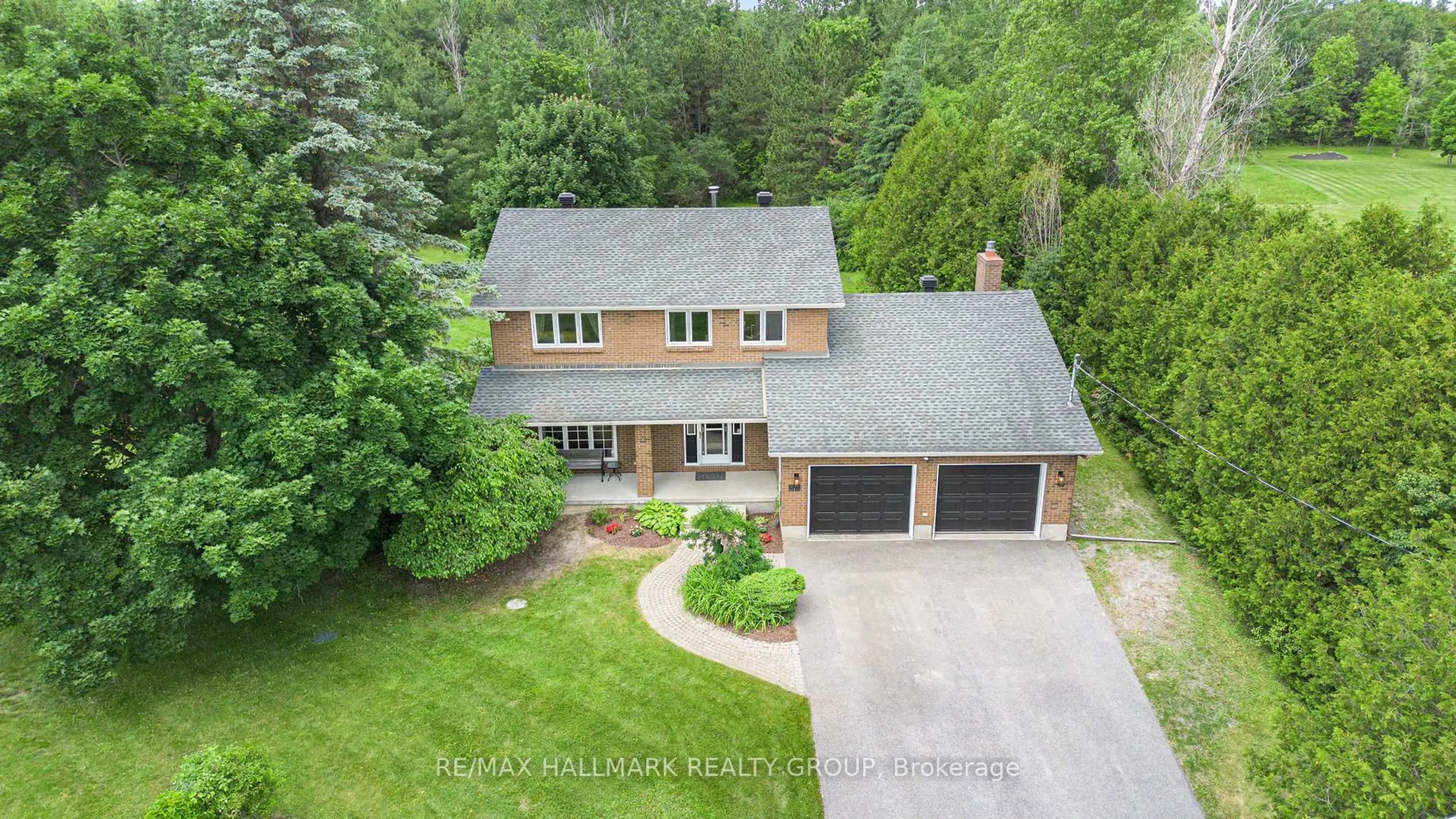 A pic from outside/outdoor area/front of a property/back of a property/a pic from drone, street for 34 Grierson Lane, Ottawa Ontario K2W 1A6