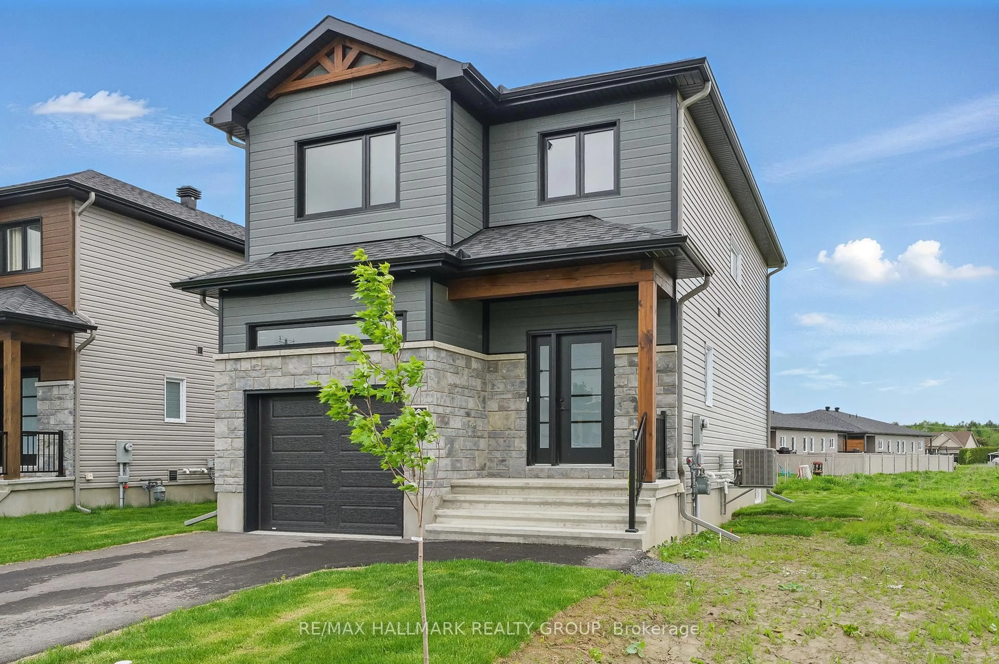 Home with brick exterior material, street for 319 Zakari St, Casselman Ontario K0A 1M0