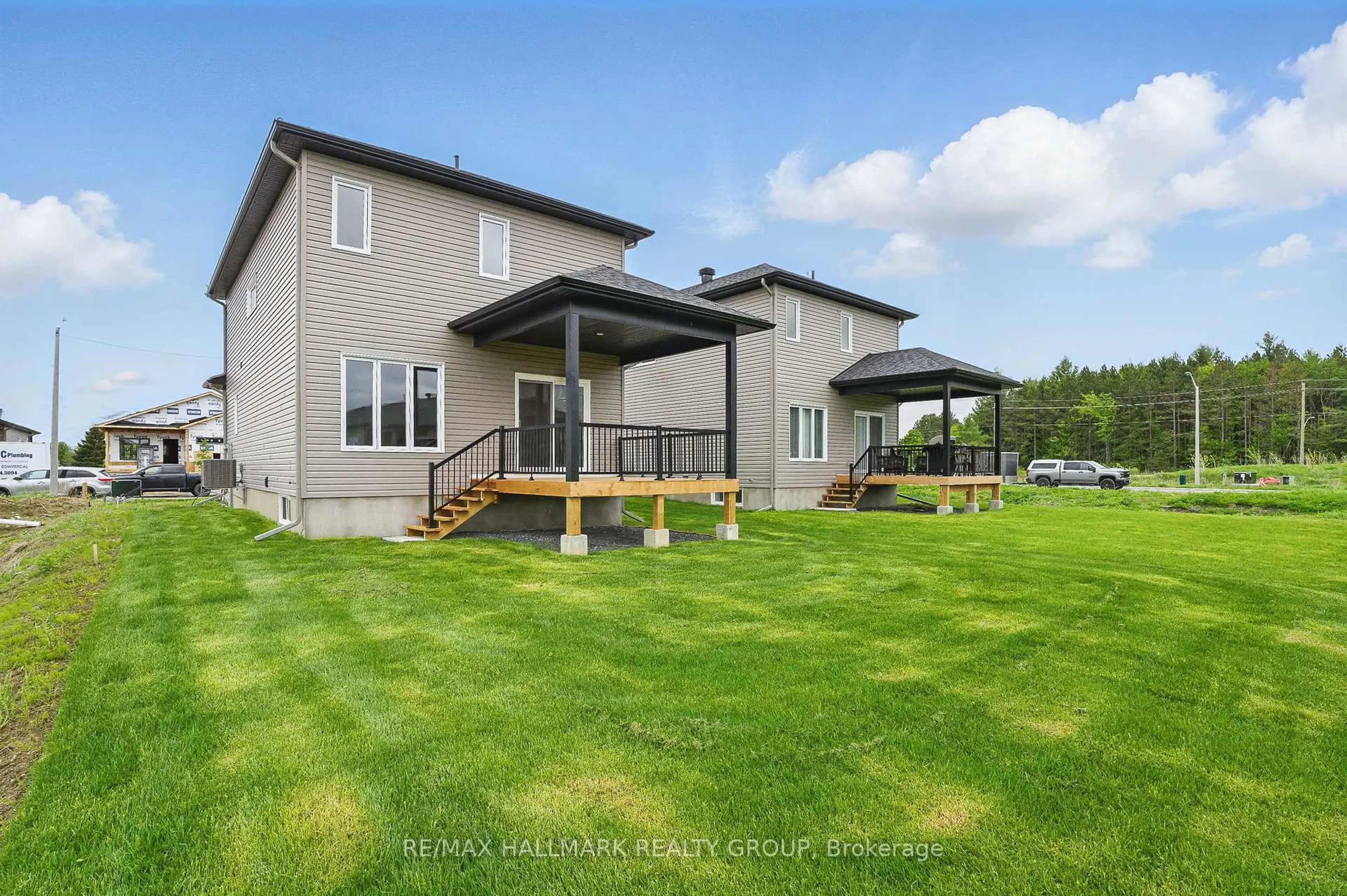 A pic from outside/outdoor area/front of a property/back of a property/a pic from drone, unknown for 319 Zakari St, Casselman Ontario K0A 1M0