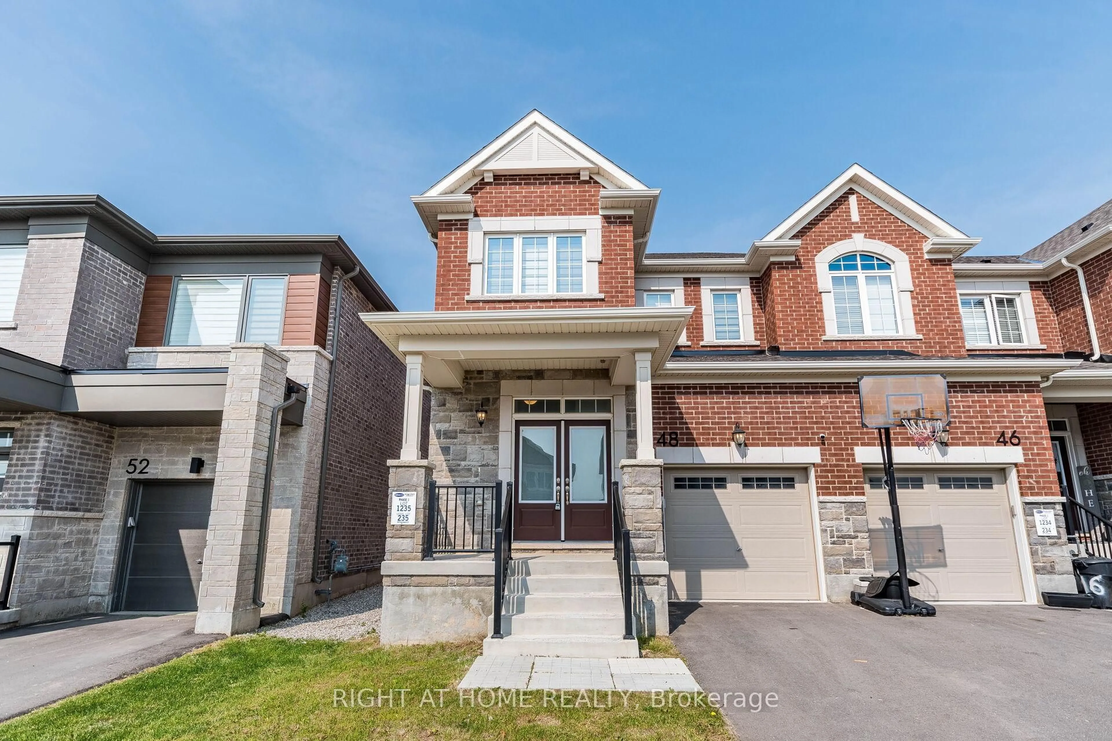 Home with brick exterior material, street for 48 Forestwalk St, Kitchener Ontario N2R 0S3