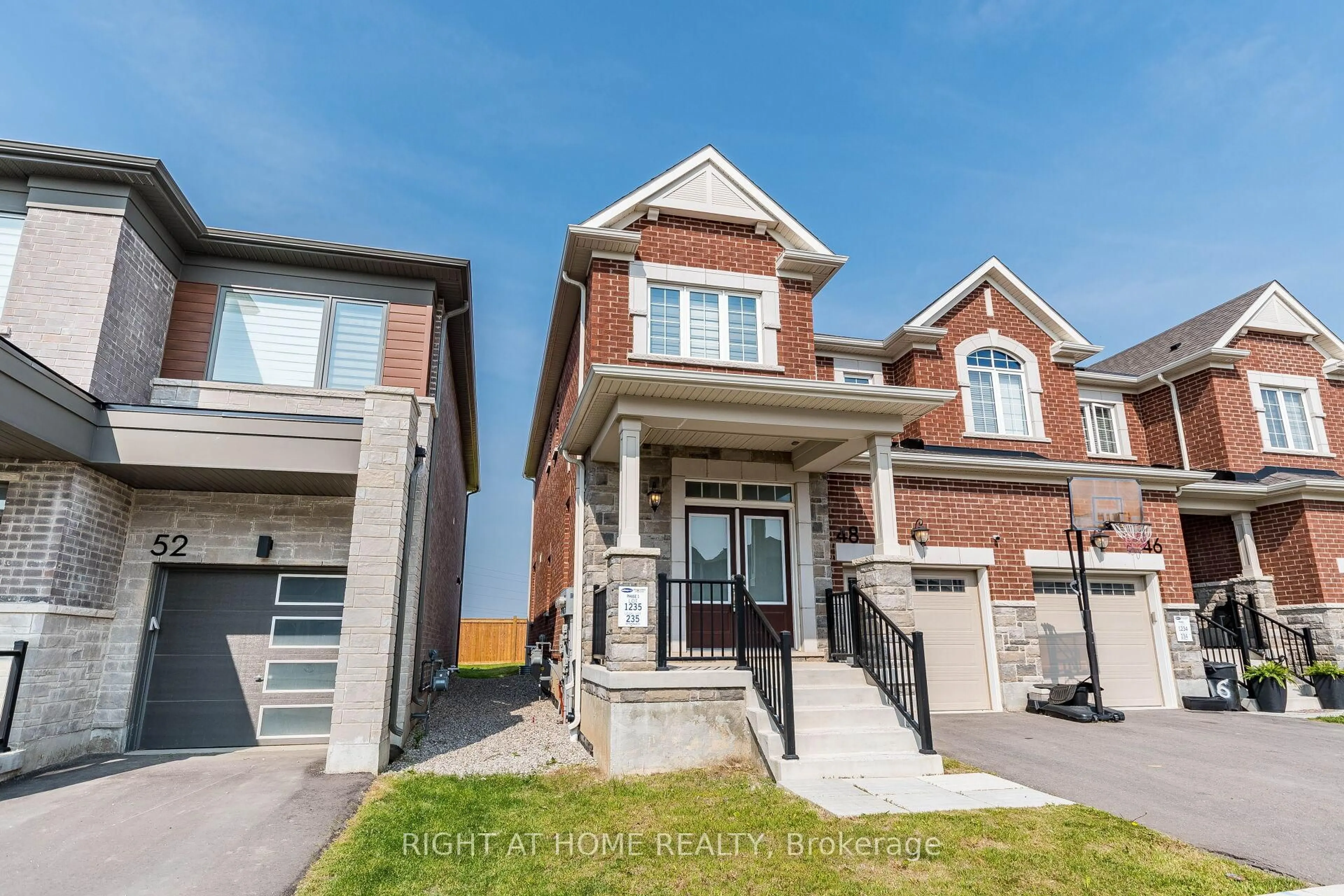 Home with brick exterior material, street for 48 Forestwalk St, Kitchener Ontario N2R 0S3