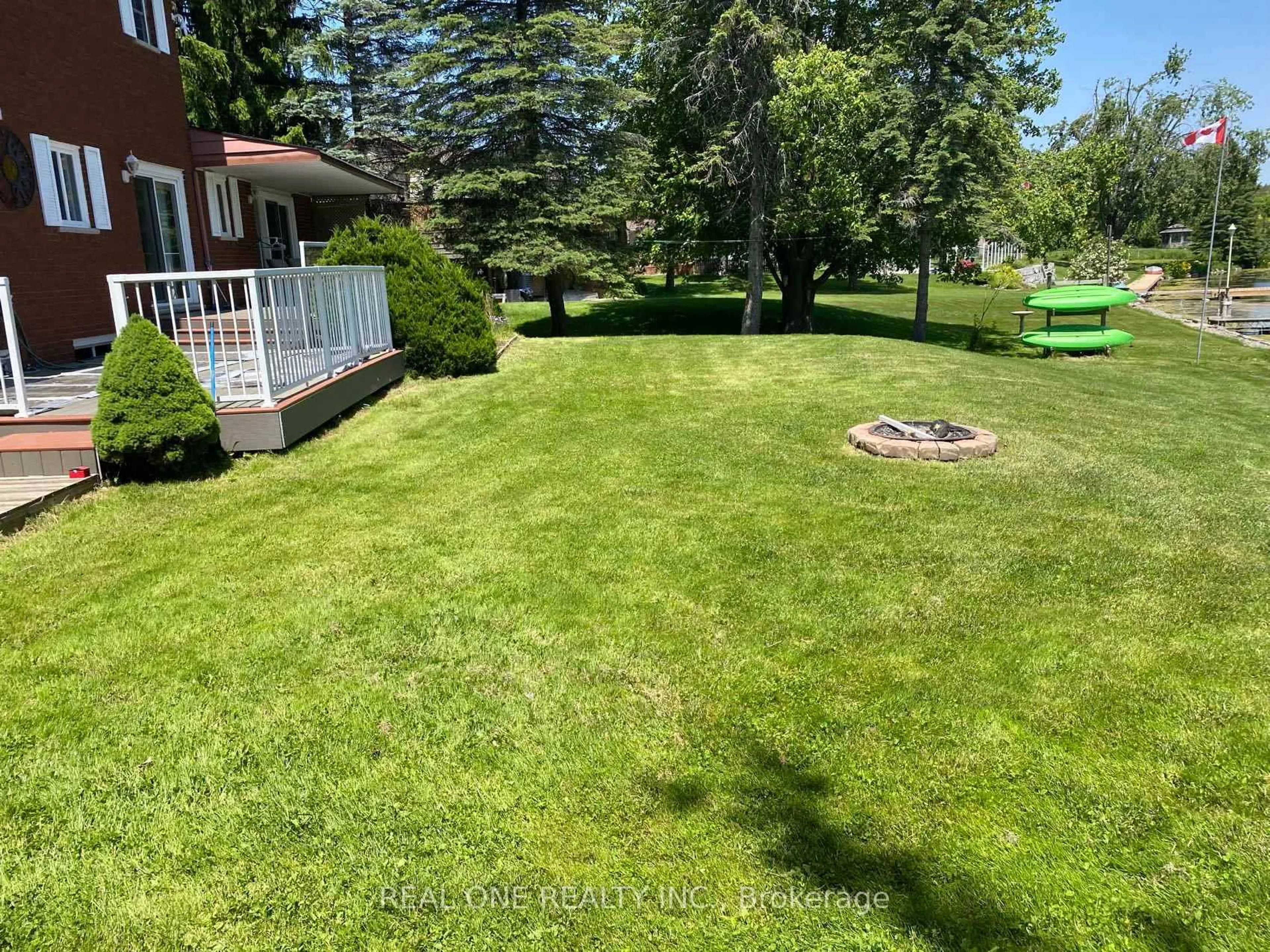 A pic from outside/outdoor area/front of a property/back of a property/a pic from drone, unknown for 655 Turtle Bay Blvd. North Blvd, Selwyn Ontario K0L 1T0