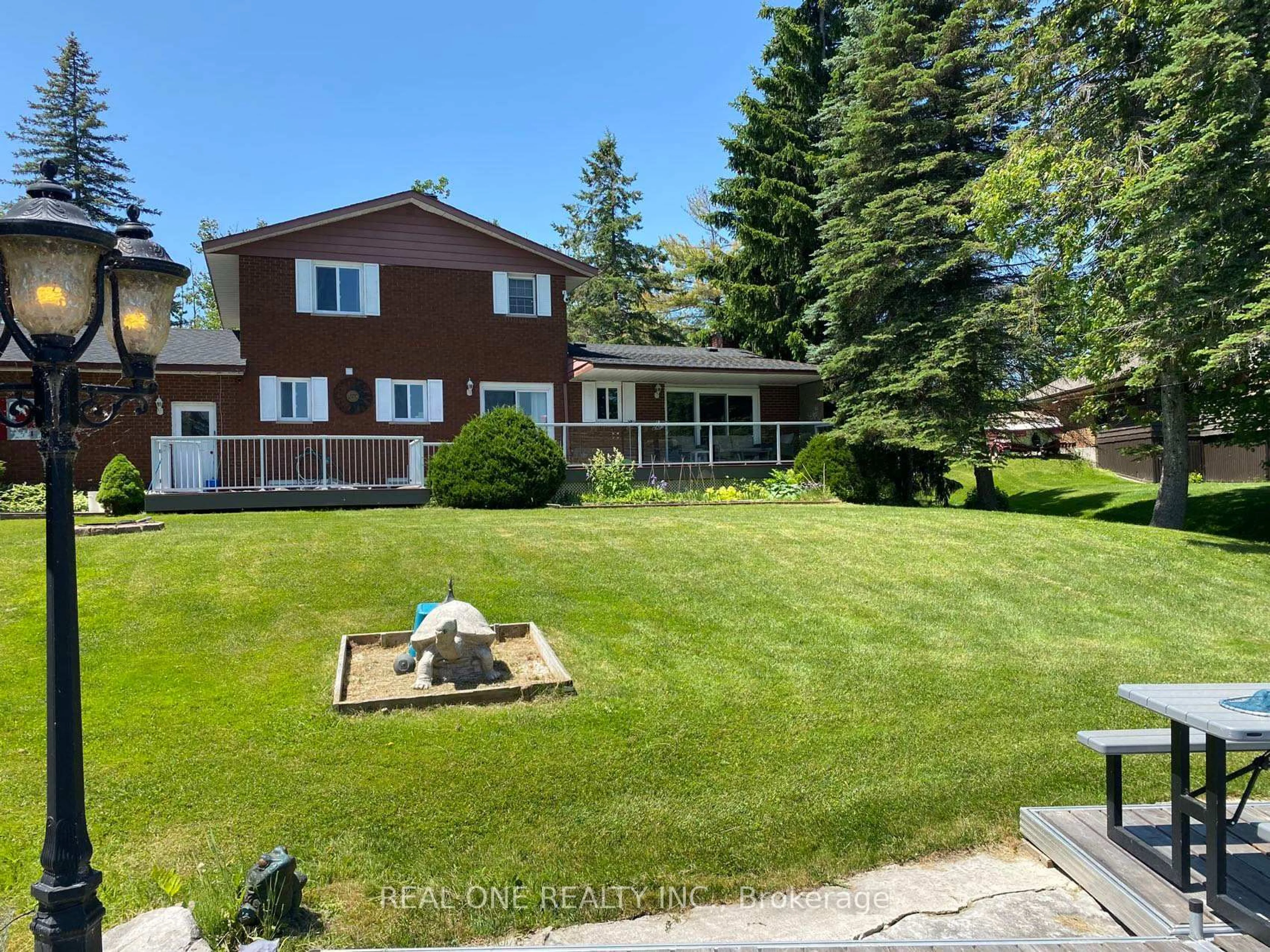 A pic from outside/outdoor area/front of a property/back of a property/a pic from drone, unknown for 655 Turtle Bay Blvd. North Blvd, Selwyn Ontario K0L 1T0