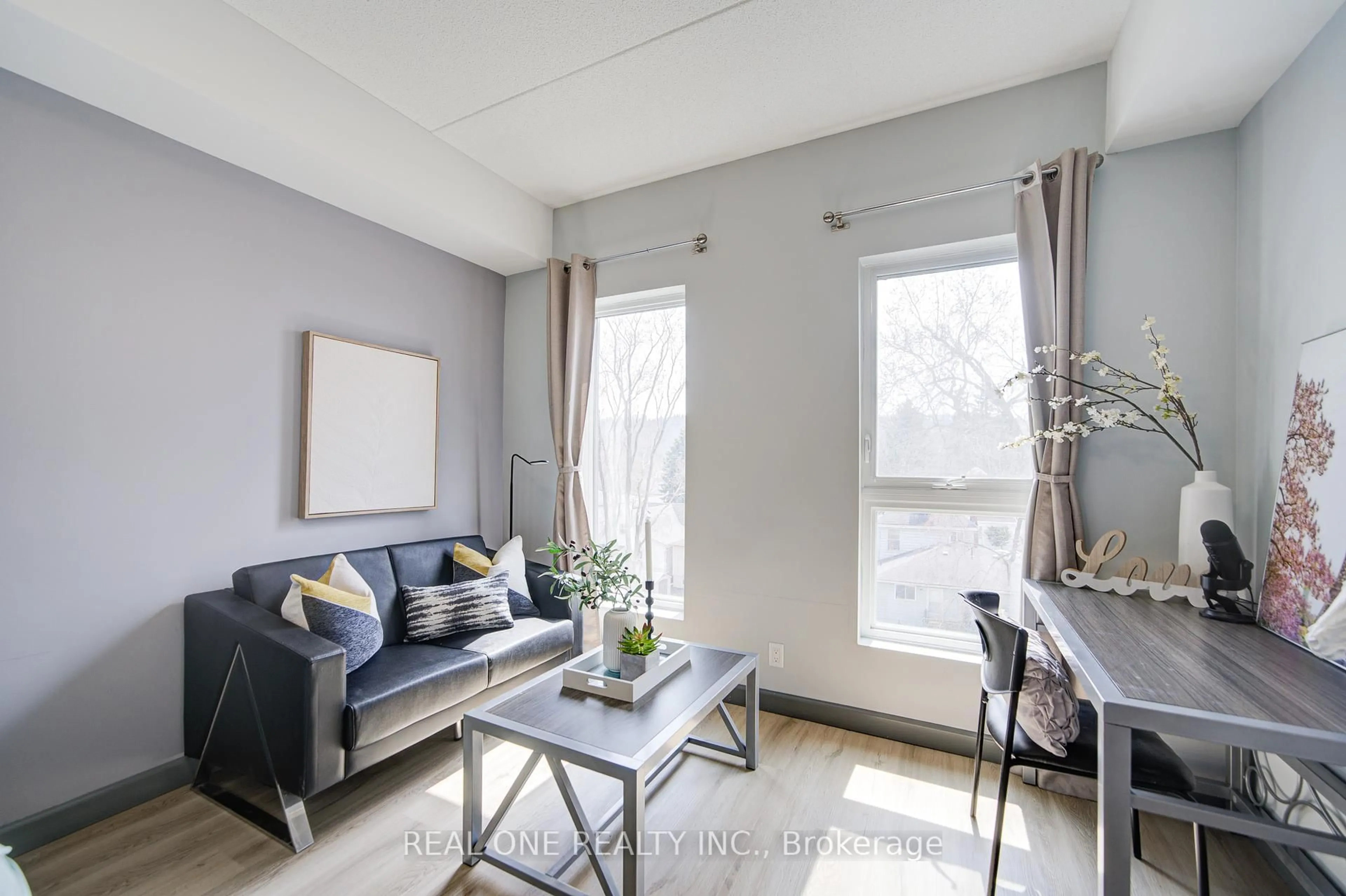 Living room with furniture, unknown for 77 Leland St #423, Hamilton Ontario L8S 3A1