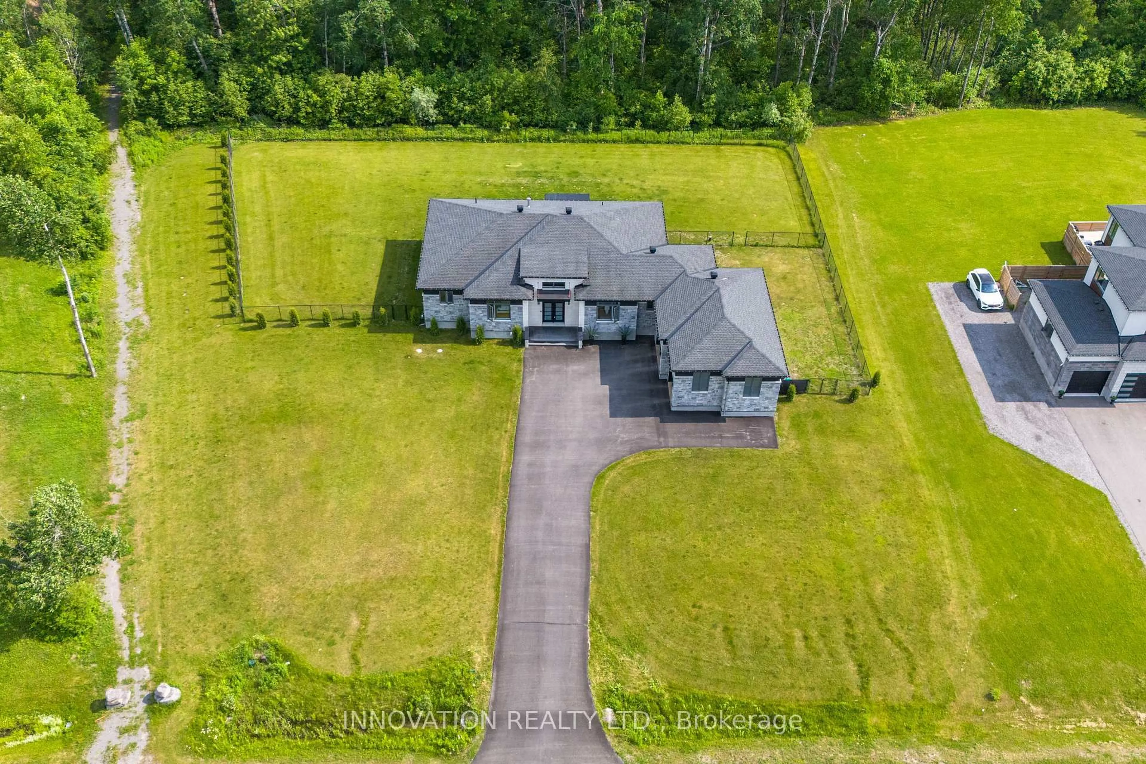 A pic from outside/outdoor area/front of a property/back of a property/a pic from drone, unknown for 651 Ballycastle Cres, Ottawa Ontario K1X 0A3