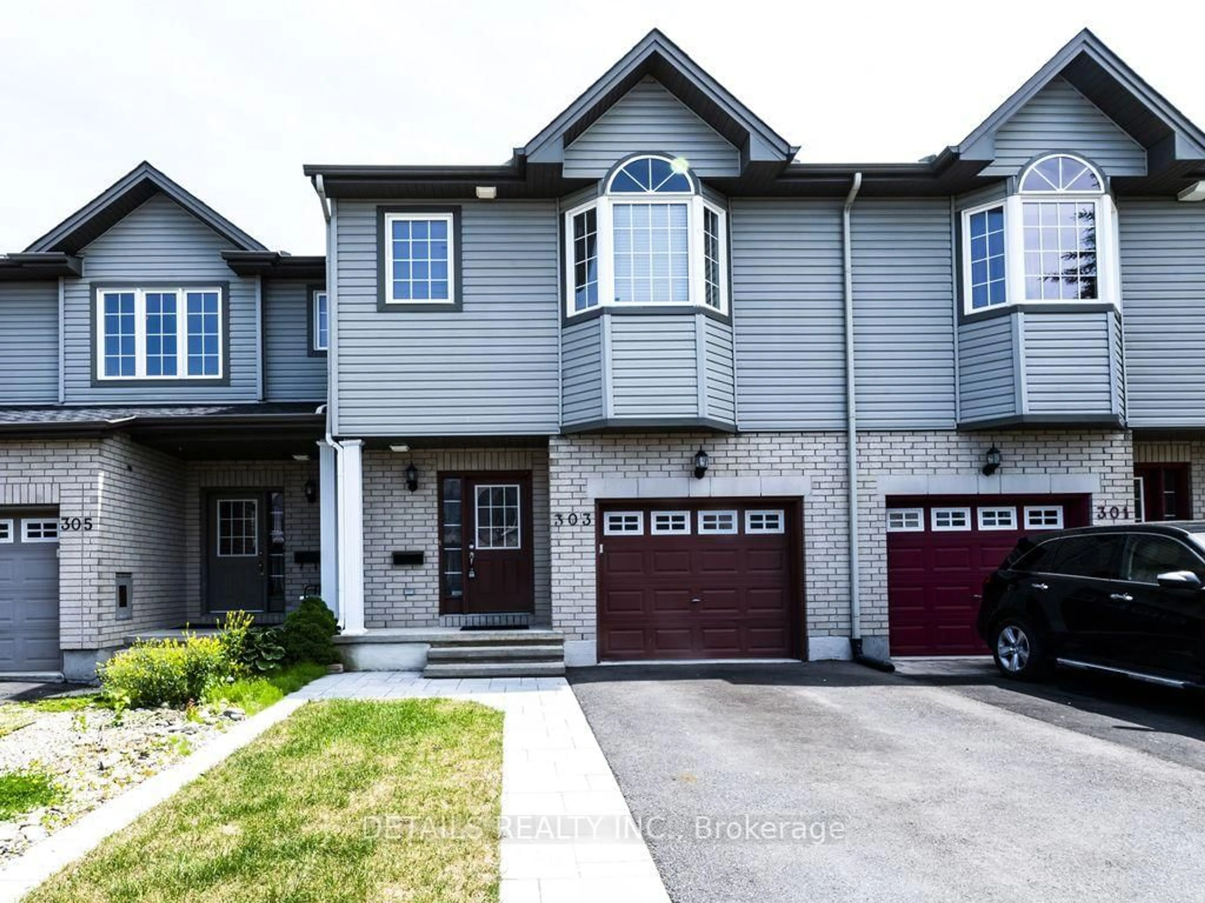 Home with brick exterior material, street for 303 Brigitta St, Ottawa Ontario K2S 0H8