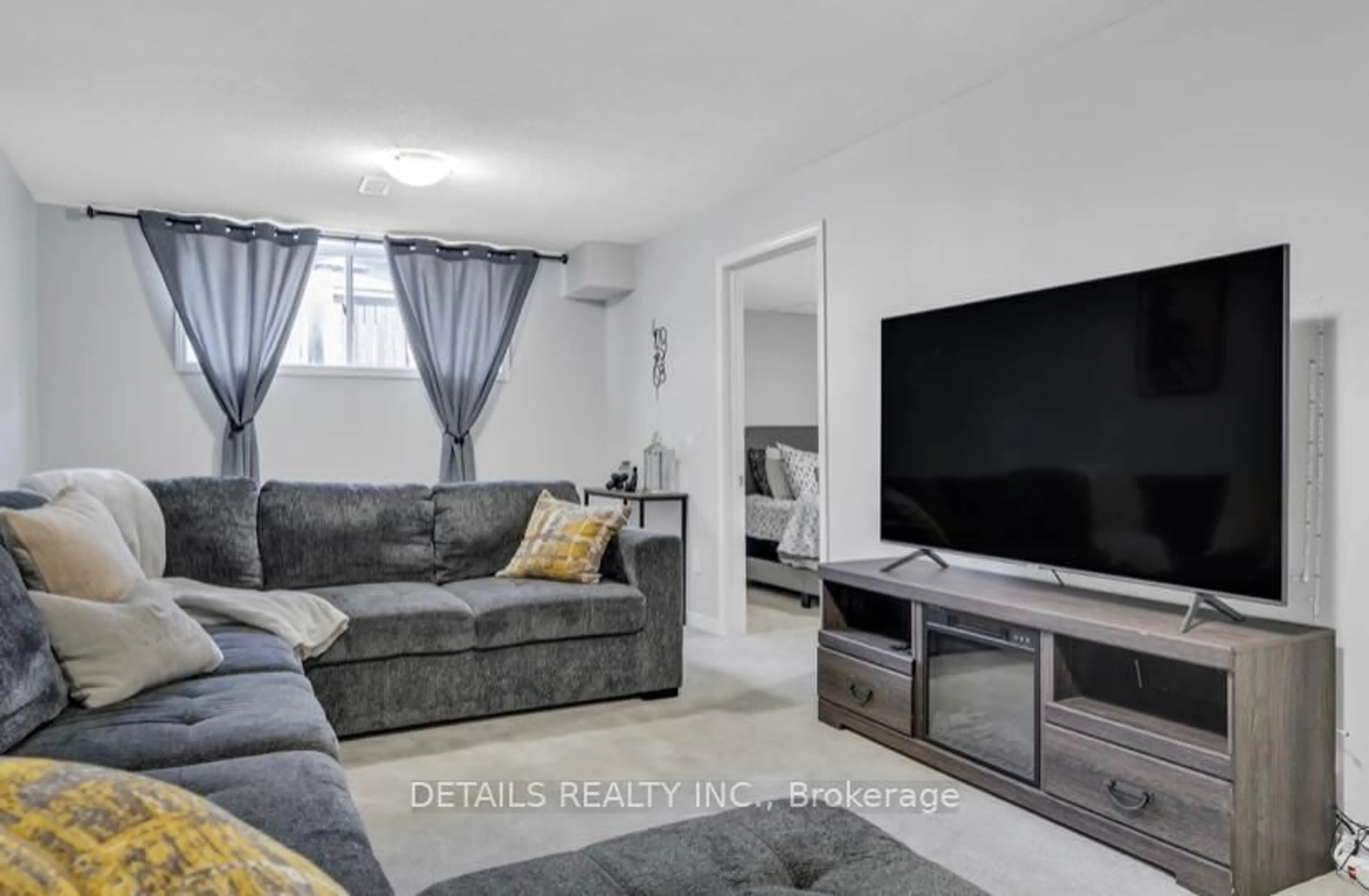 Living room with furniture, unknown for 303 Brigitta St, Ottawa Ontario K2S 0H8