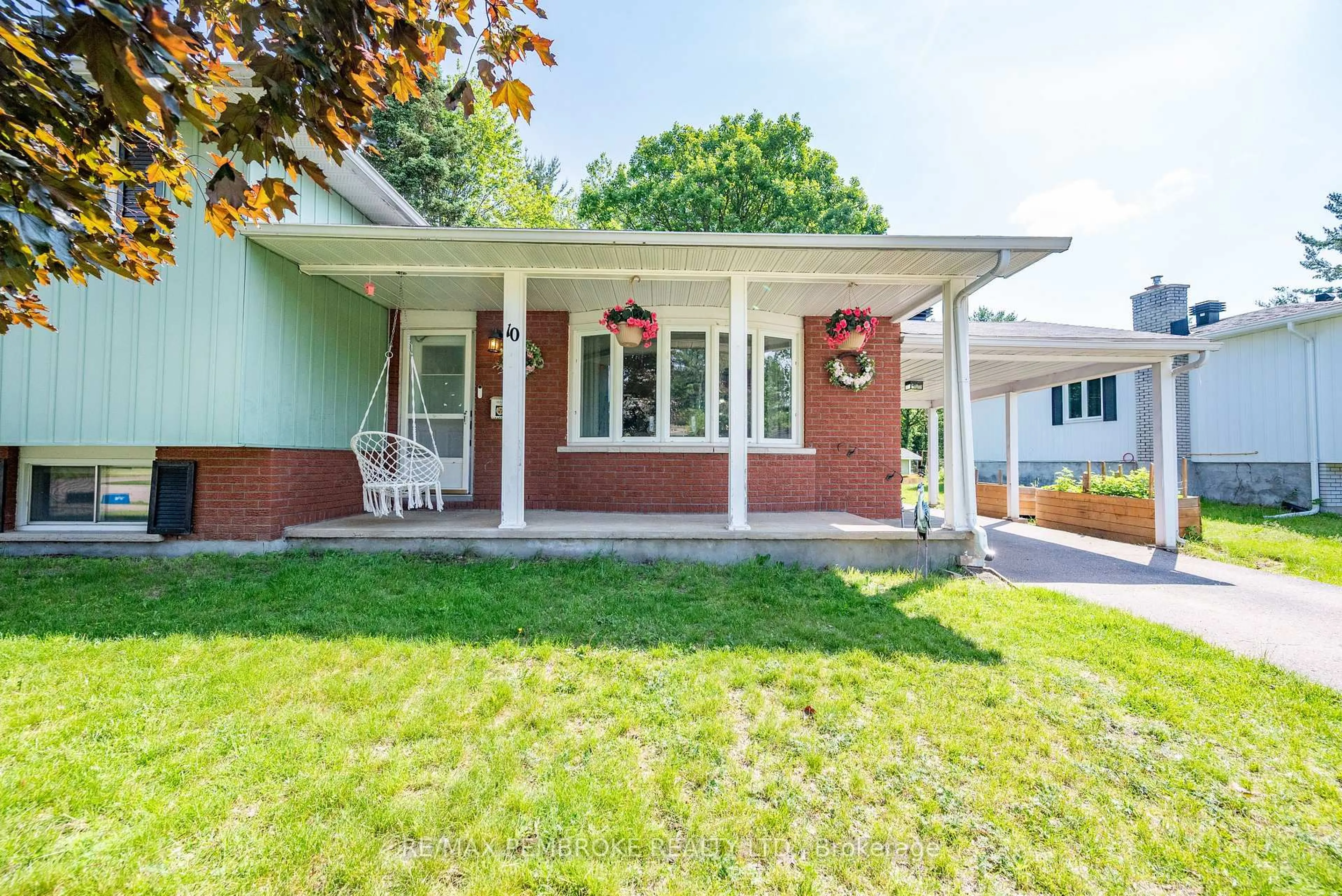 Home with brick exterior material, street for 10 Pine Pl, Petawawa Ontario K8H 2Y6