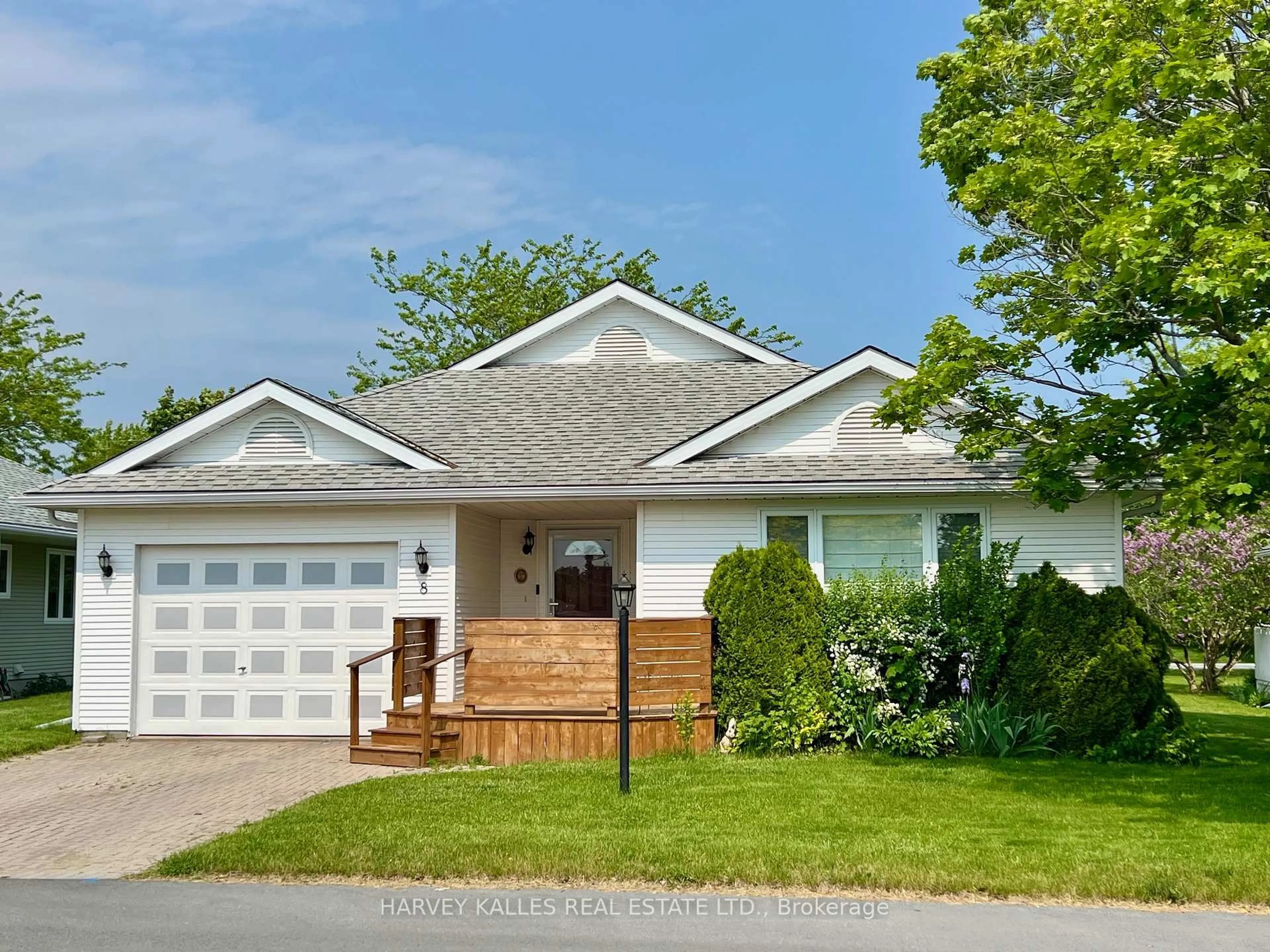 Home with vinyl exterior material, street for 8 Heritage Dr, Prince Edward County Ontario K0K 3L0